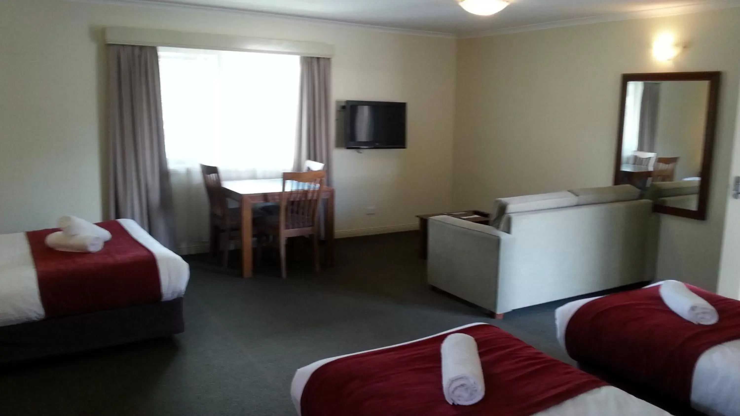 Photo of the whole room, TV/Entertainment Center in Armidale Pines Motel