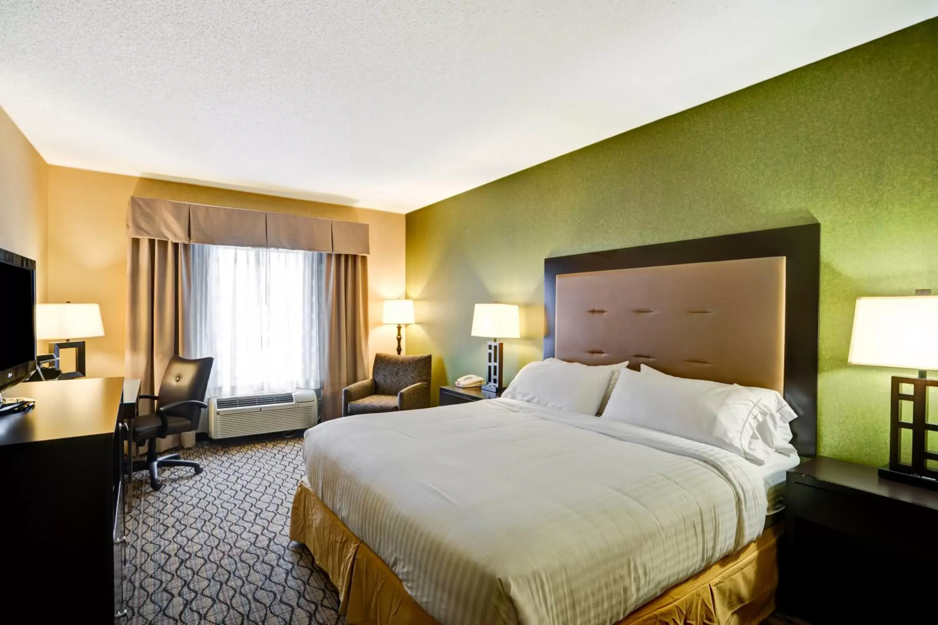 Bed in Holiday Inn Express Hotel & Suites Christiansburg, an IHG Hotel