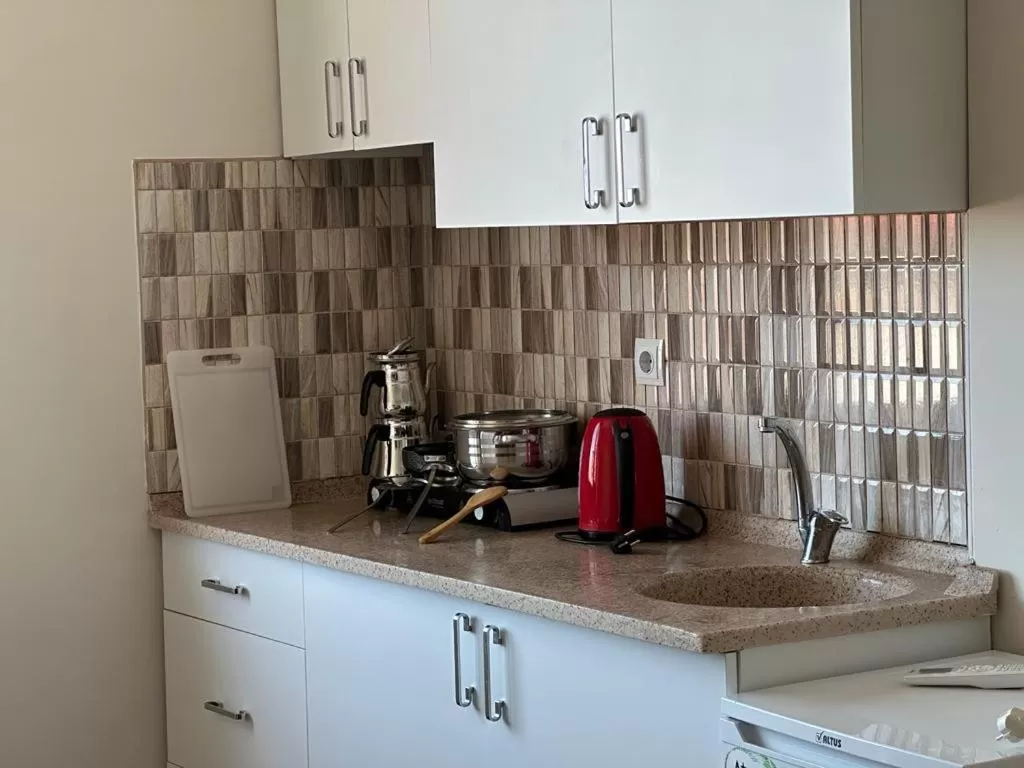 Kitchen/Kitchenette in Bikka&Asell Suite Hotel