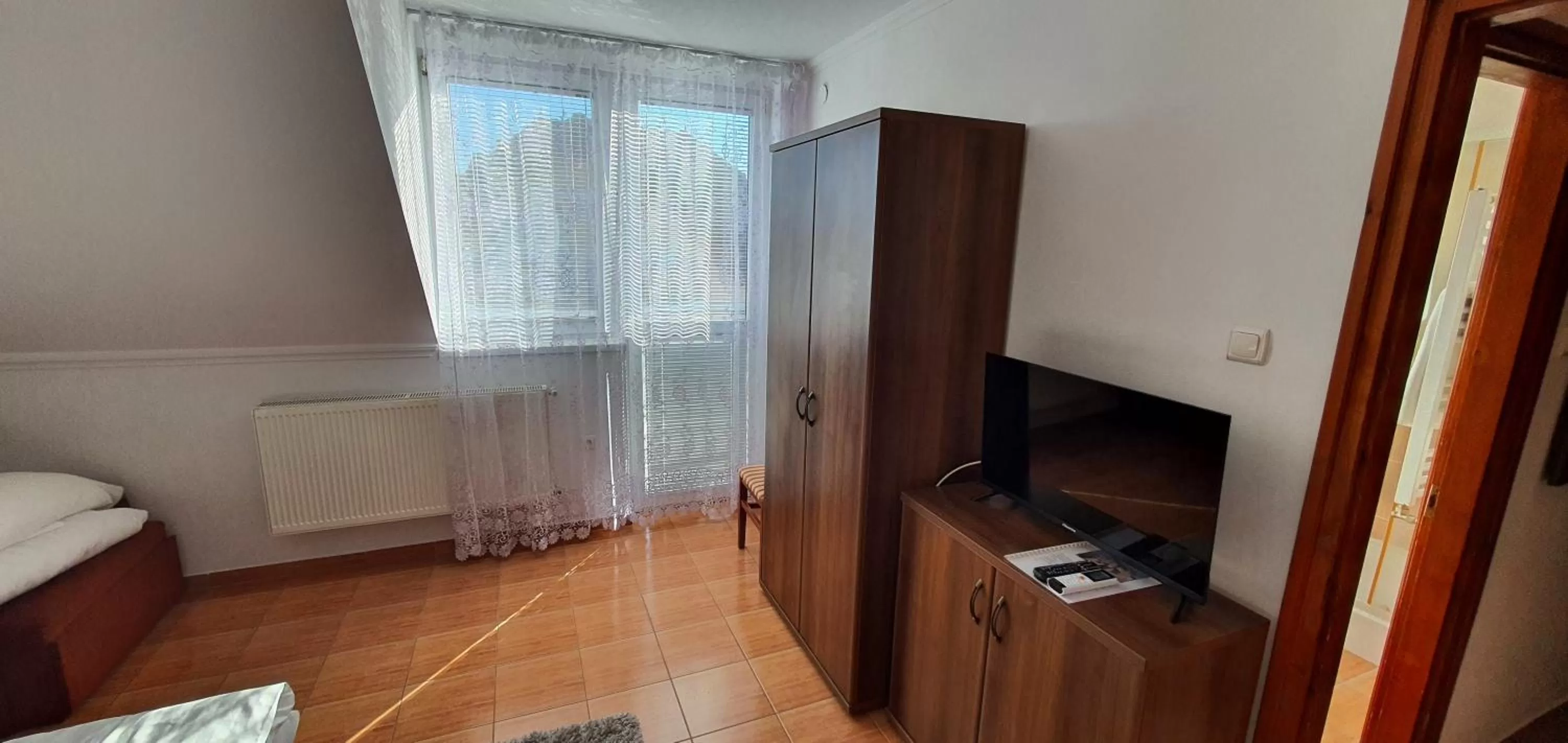 Bed in Aqua Oazis Apartman