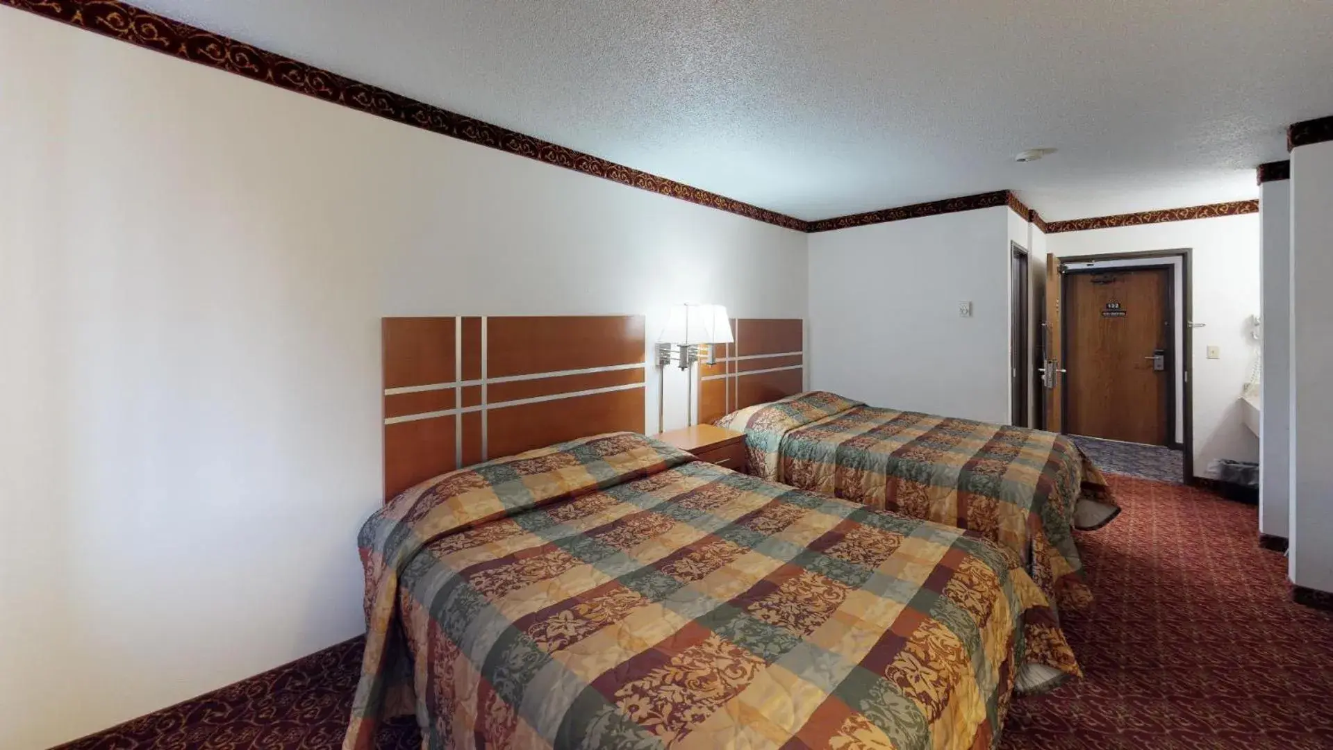 Bed in Waconia Inn and Suites