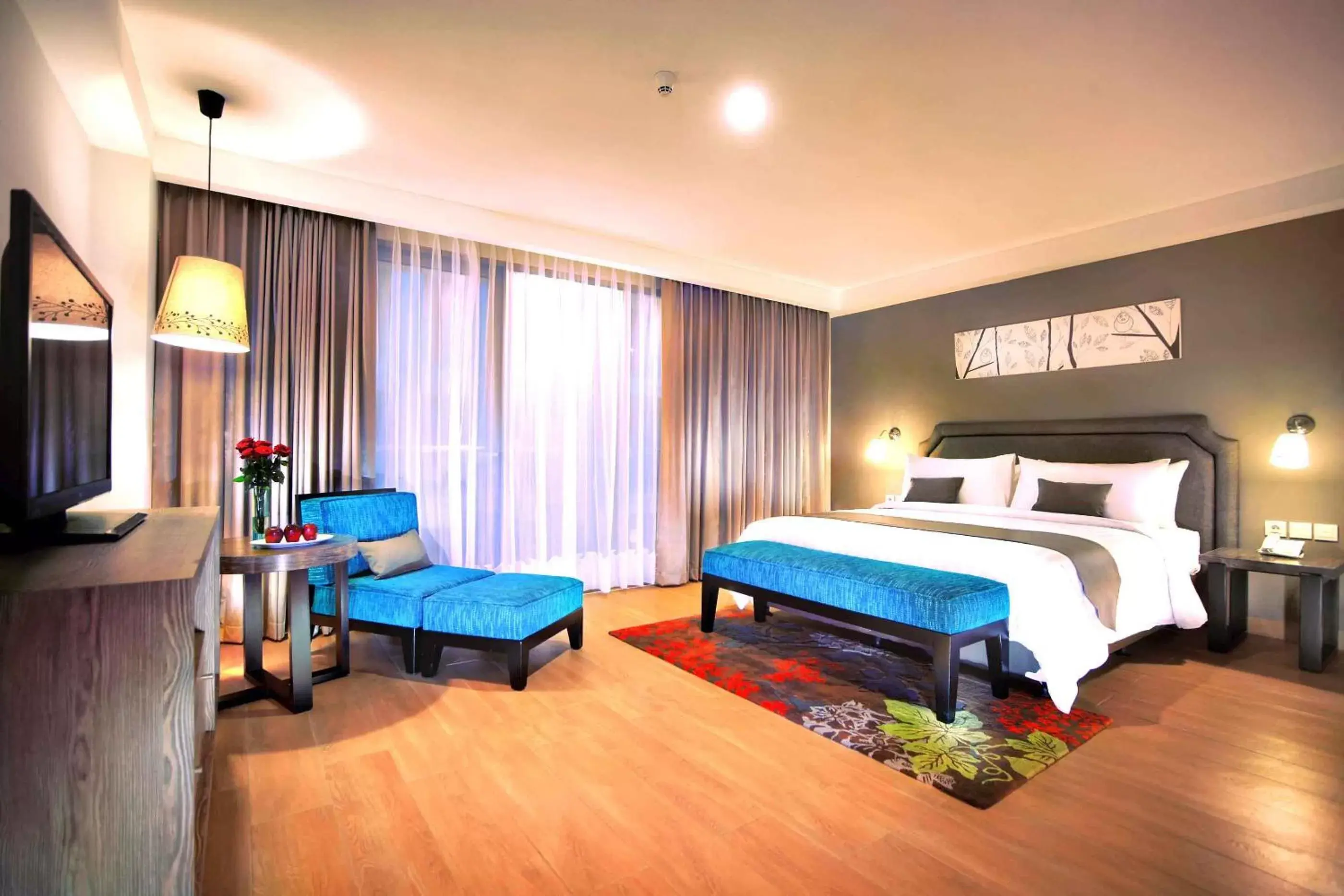 Bedroom in Harper Kuta Hotel by ASTON