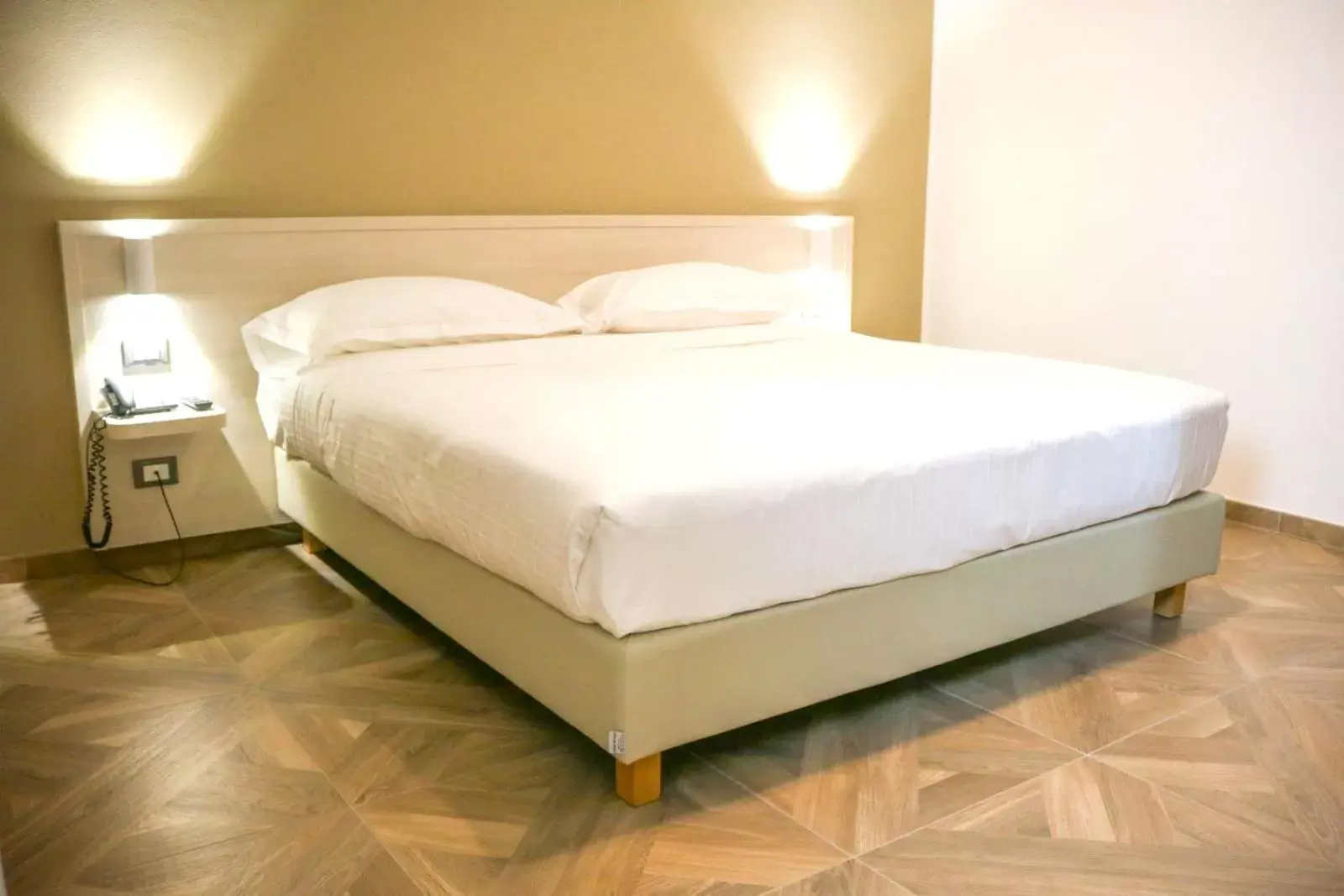 Bed in Hotel Donatello