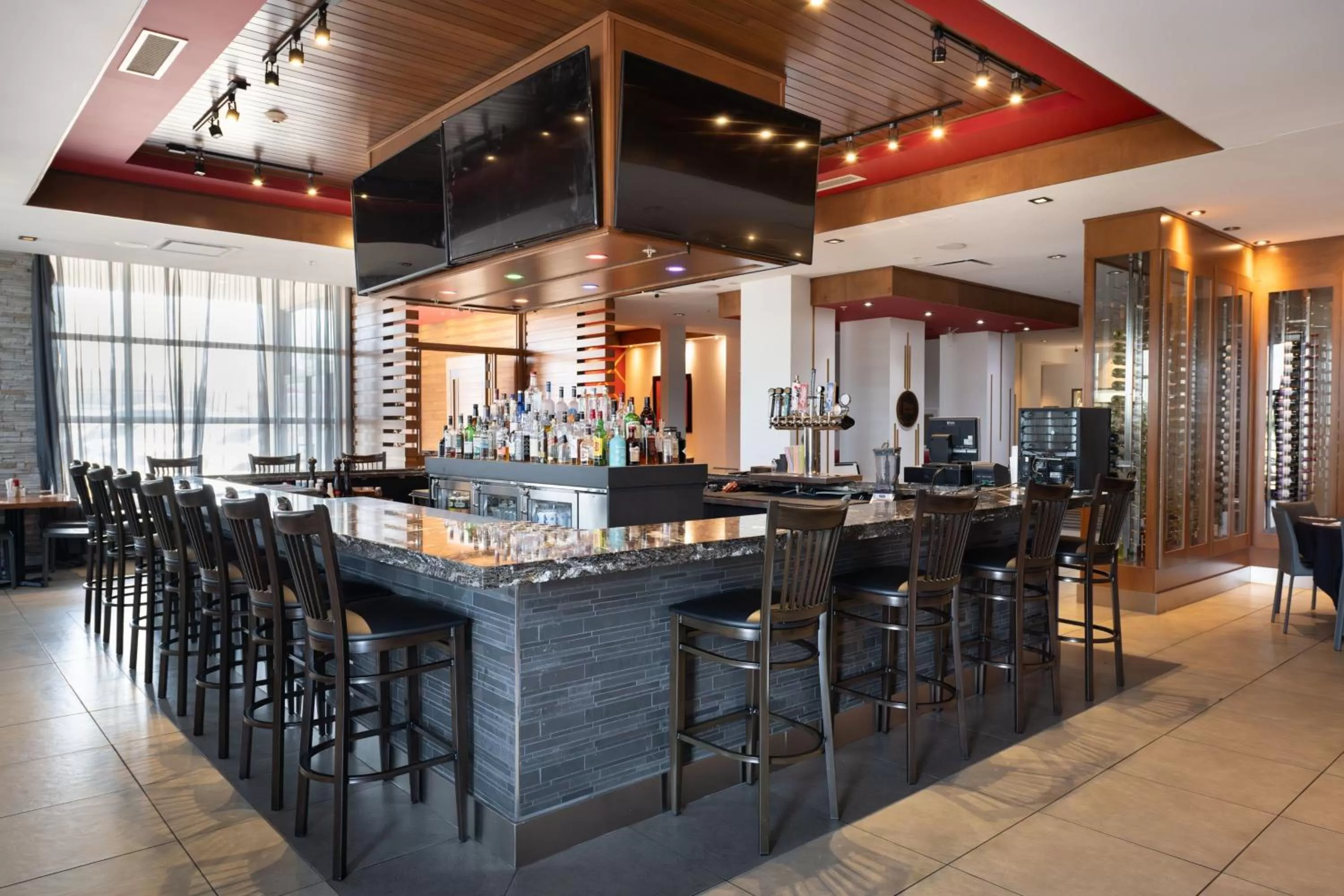 Lounge or bar in Four Points by Sheraton Edmonton International Airport