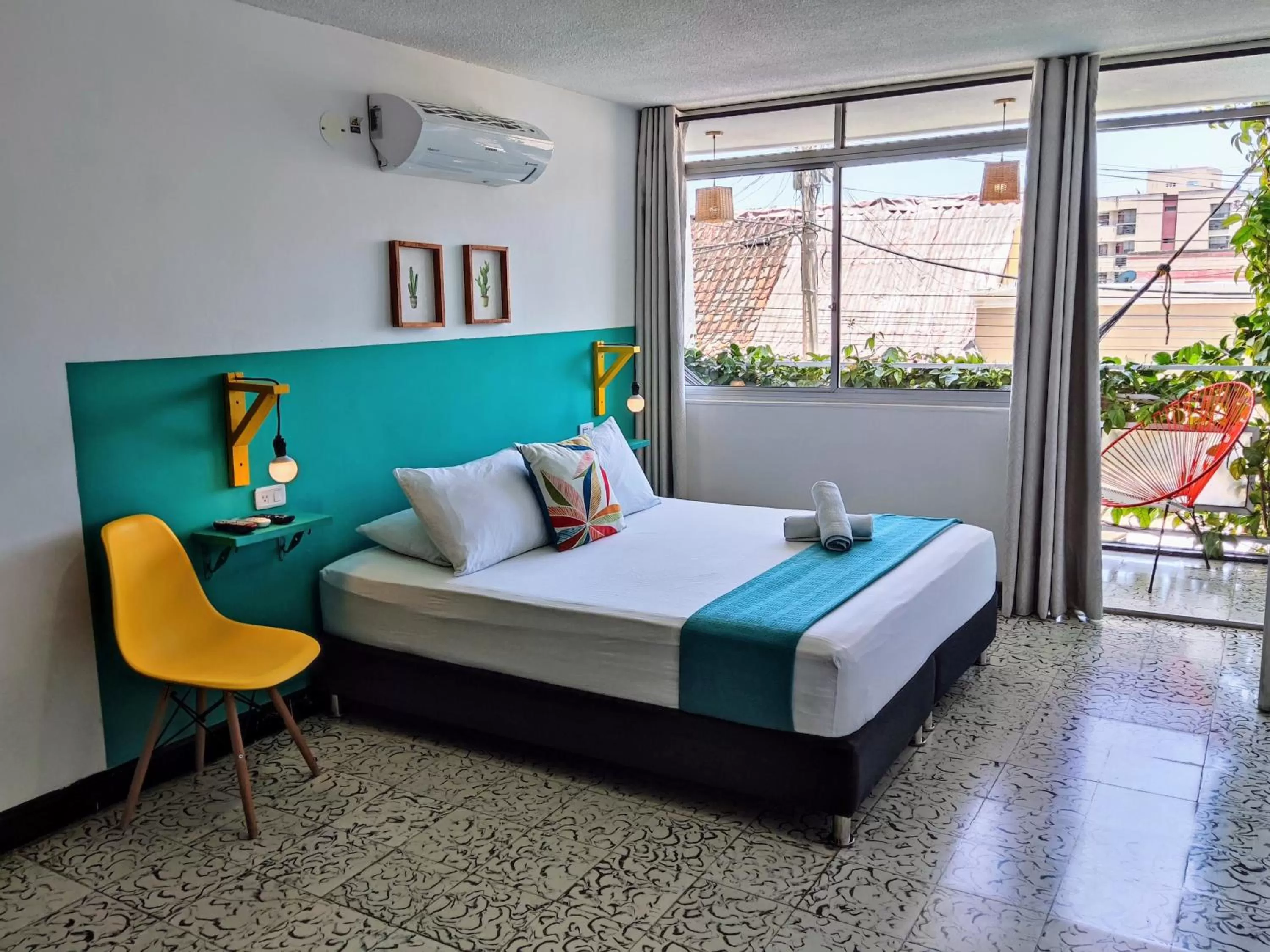 Bed in Bona Vida Hotel