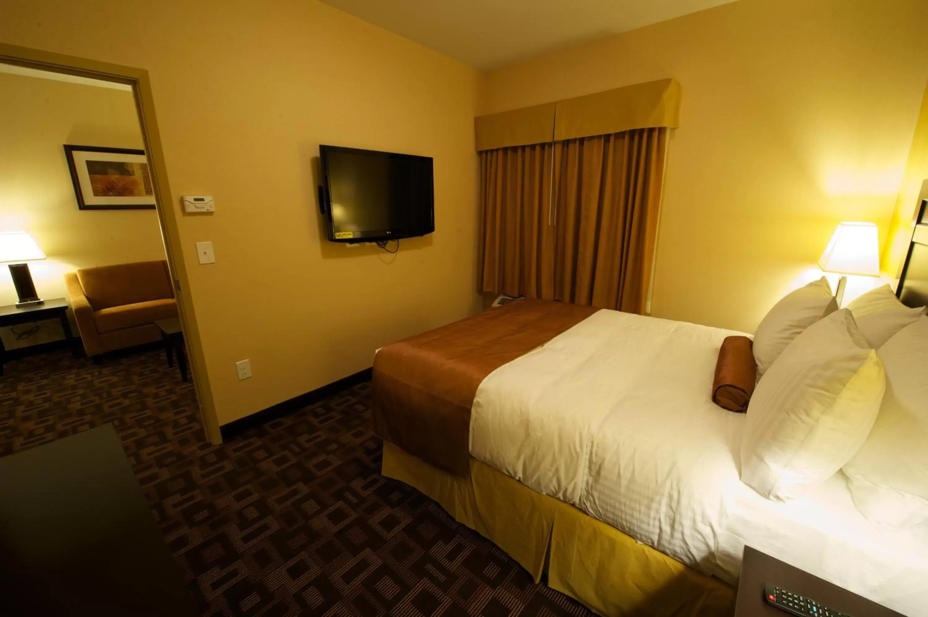 Bed in Days Inn & Suites by Wyndham Winnipeg Airport Manitoba