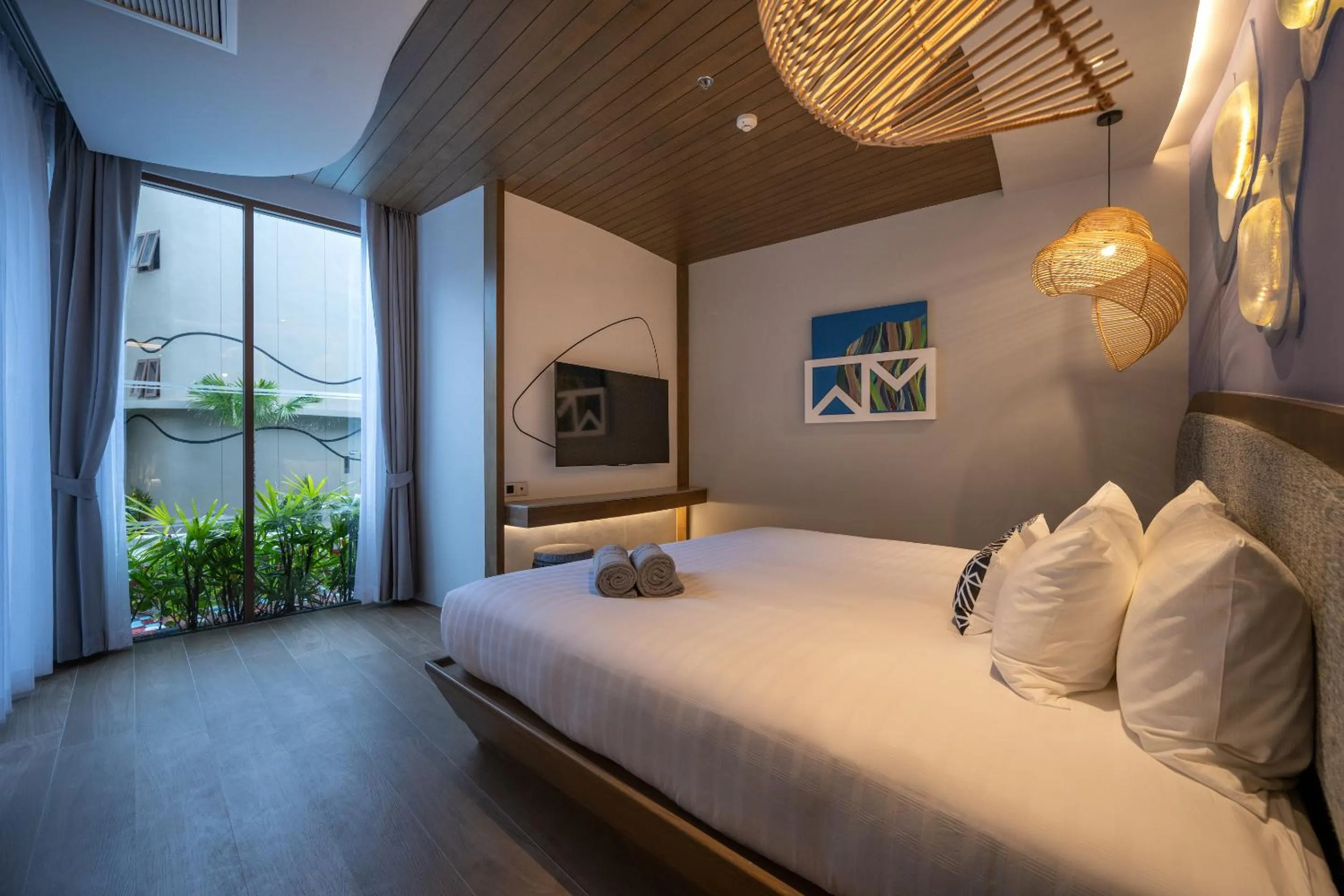 Bed in Metadee Concept Hotel