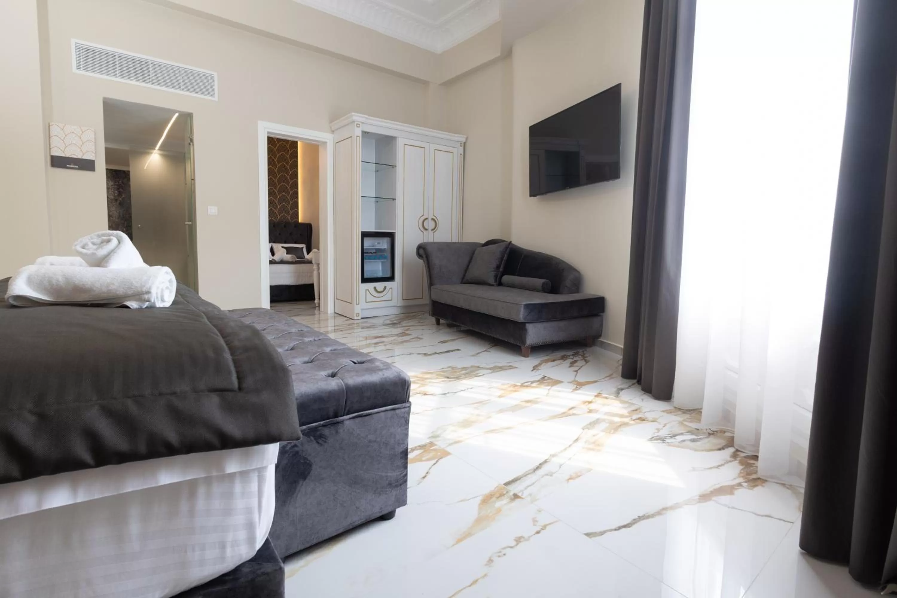 Bed in Modern Revival Luxury Hotel