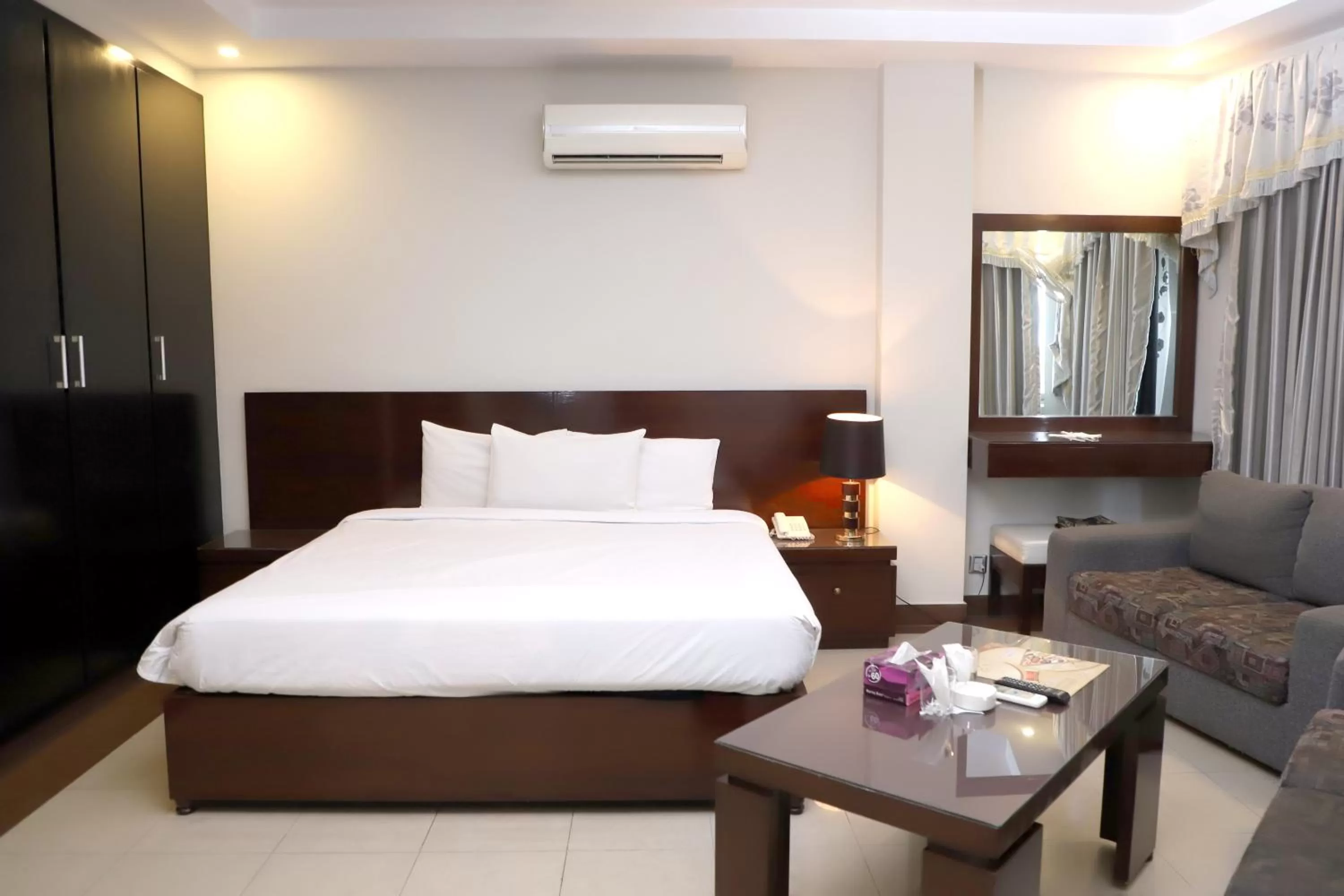 Bed in Hotel Multan Continental