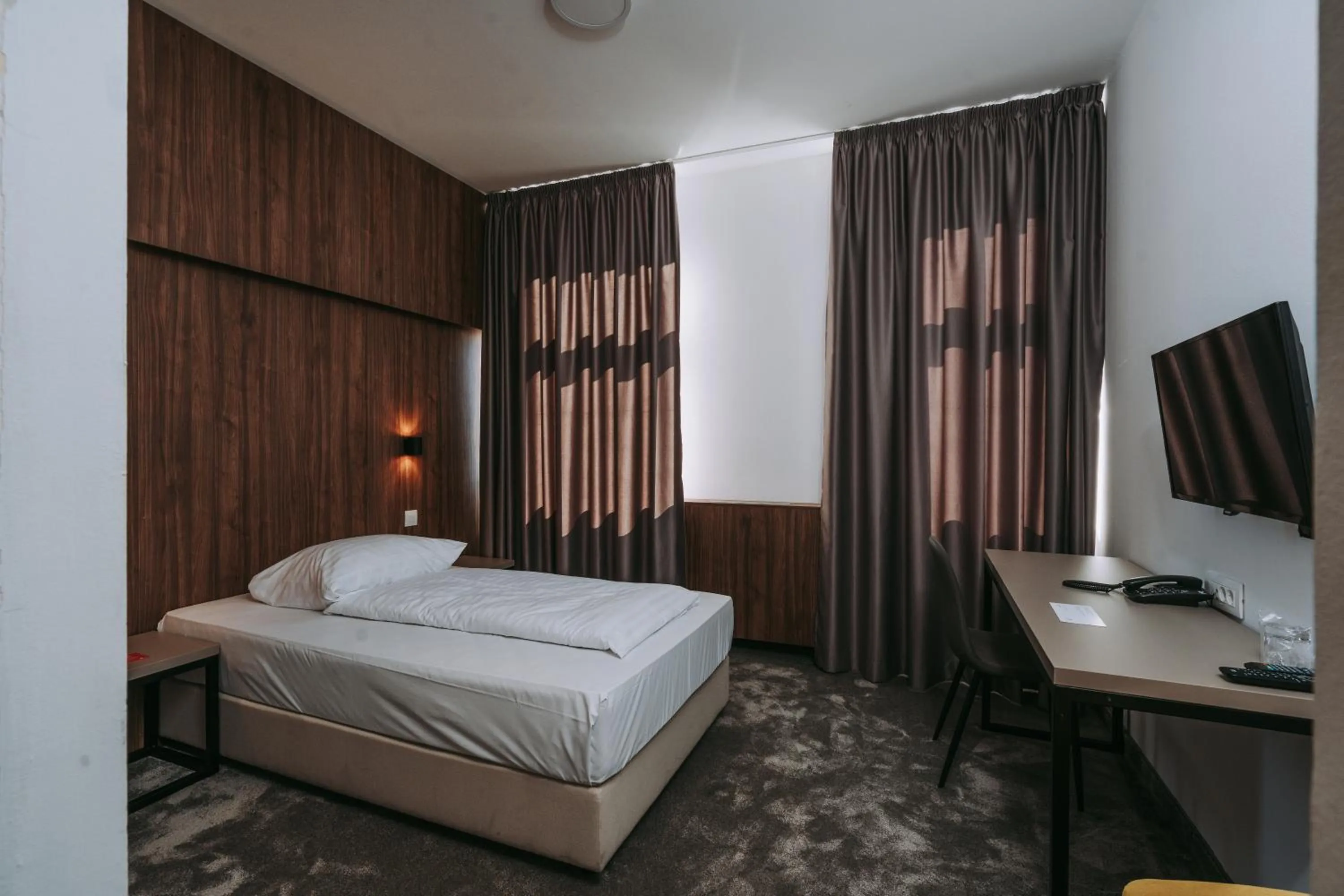 Bed in Hotel Sliško