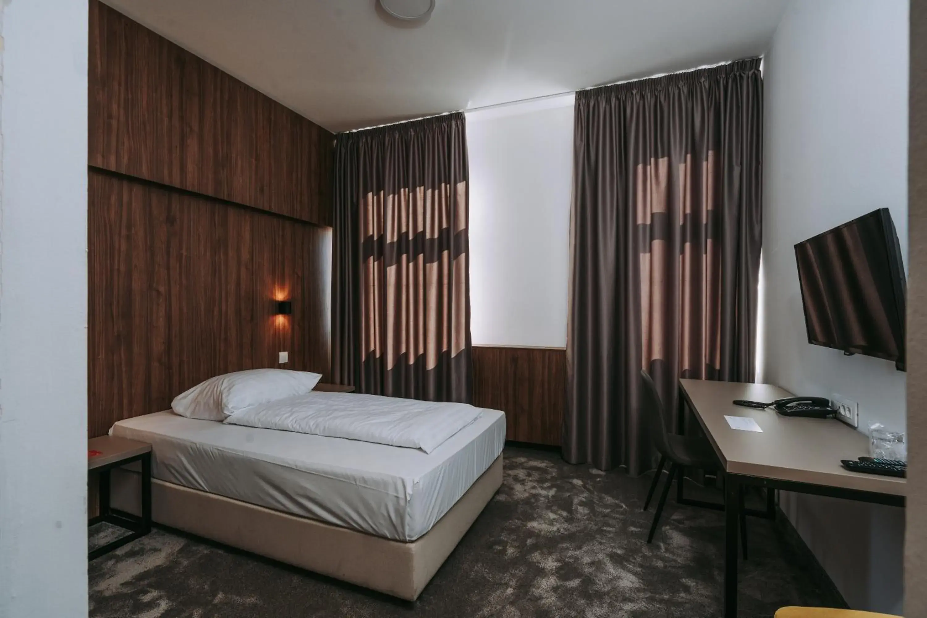 Bed in Hotel Sliško
