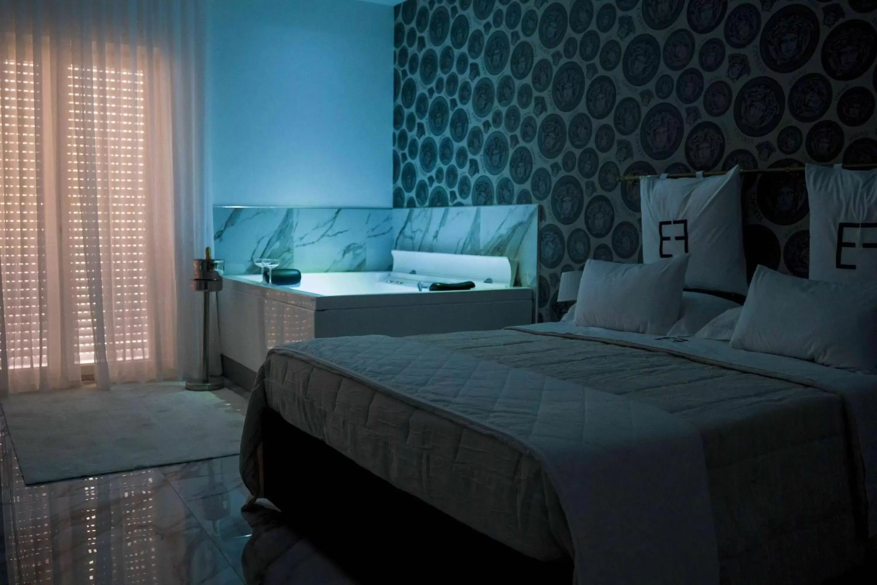 Bed in EF LUXURY LIVING RESORT AND SPA