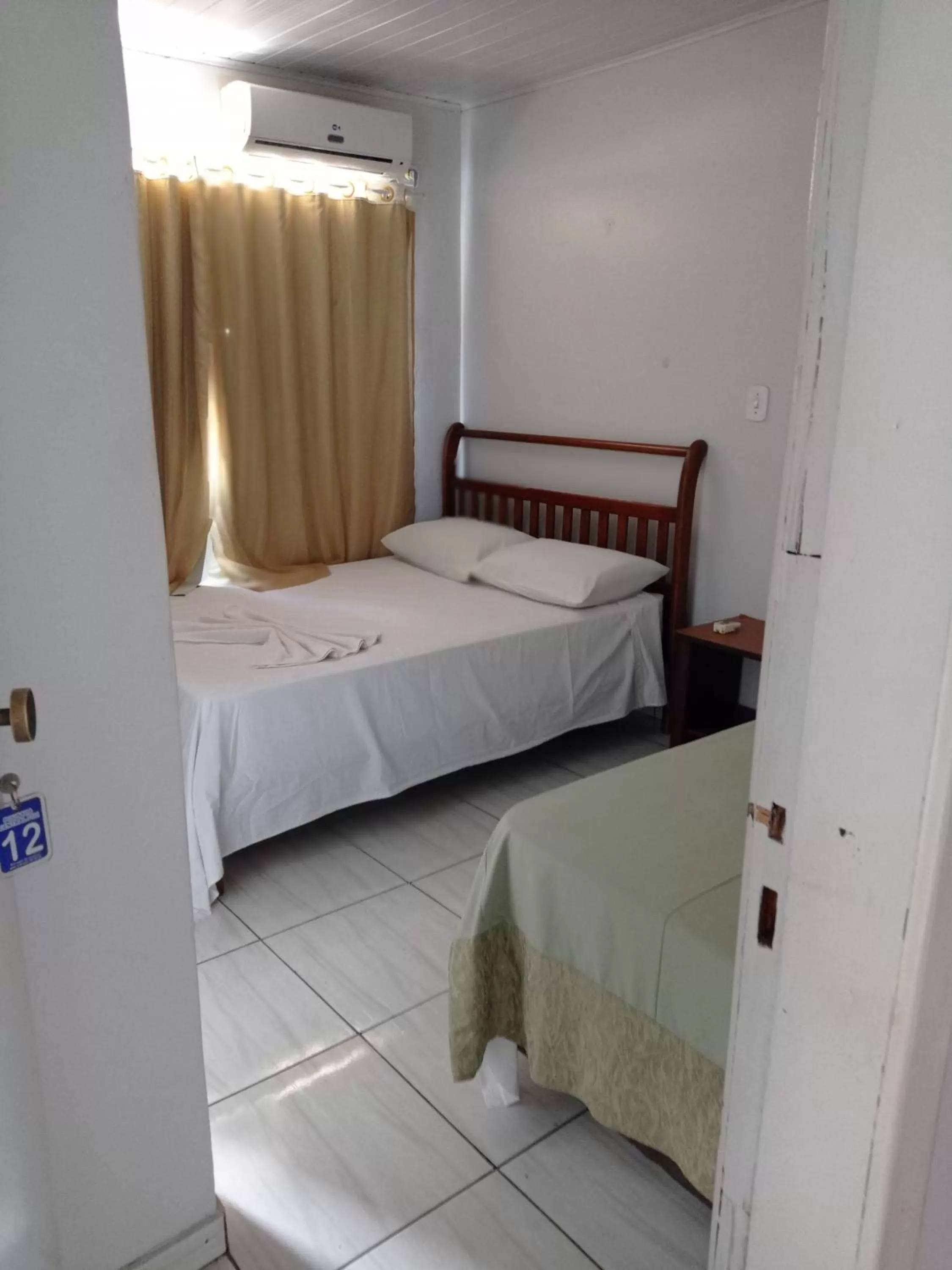 Bed in Pousada Murilo centro foz