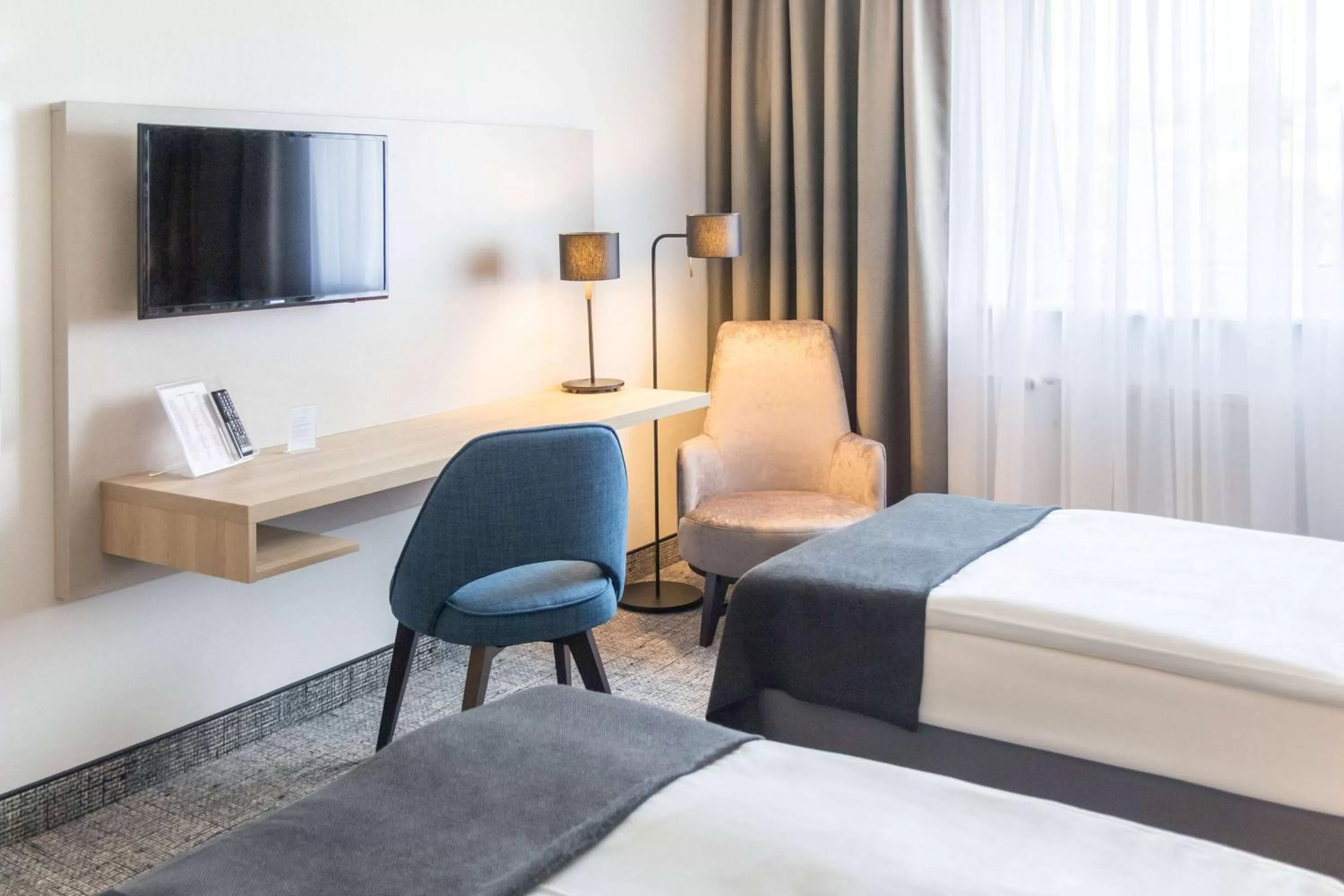 Coffee/tea facilities, Bed in Ramada by Wyndham Flensburg City
