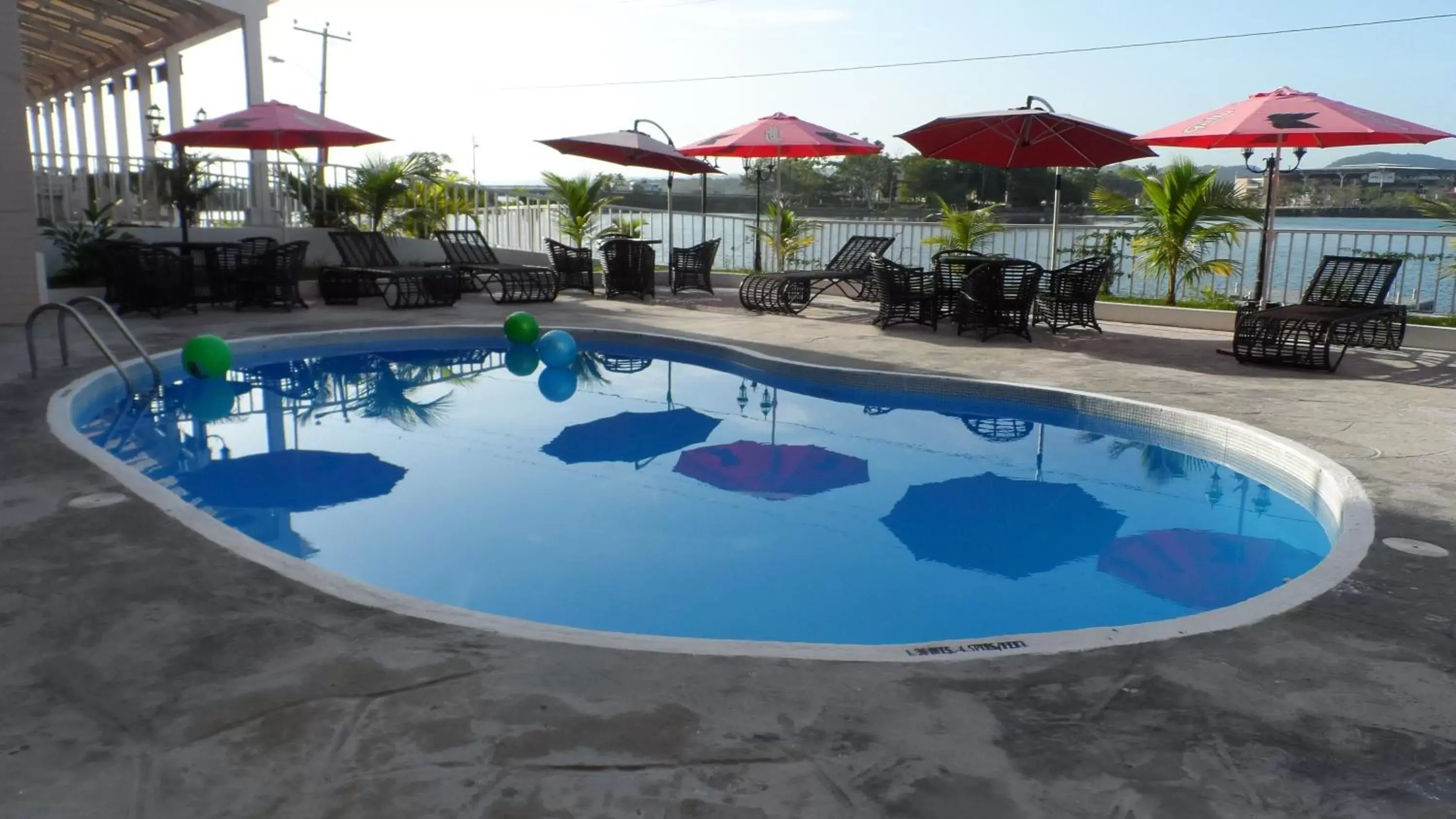 Pool view in Ramada by Wyndham Tikal Isla de Flores Pool view in Ramada by Wyndham Tikal Isla de Flores