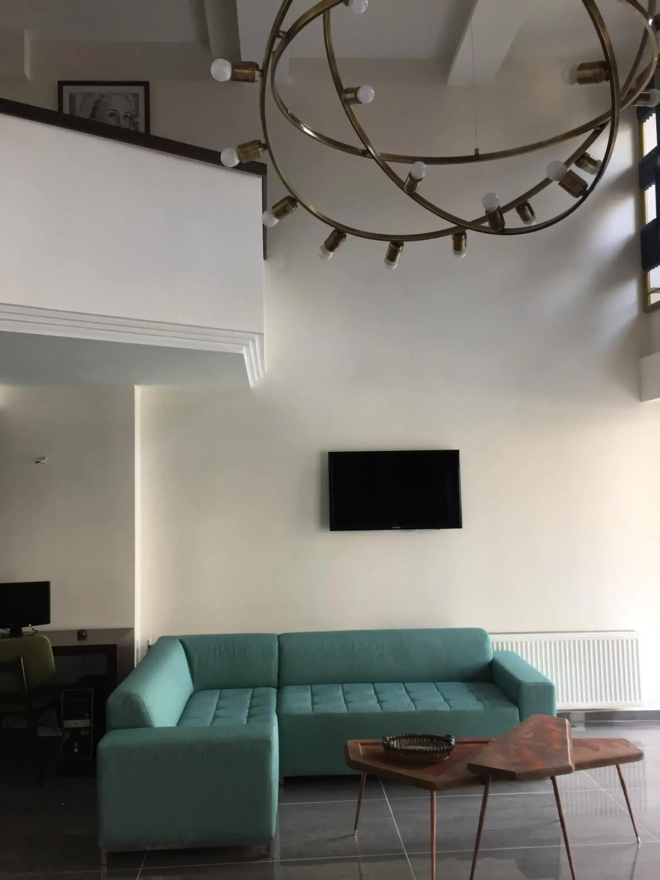 Communal lounge/ TV room, Seating Area in Helen Hotel