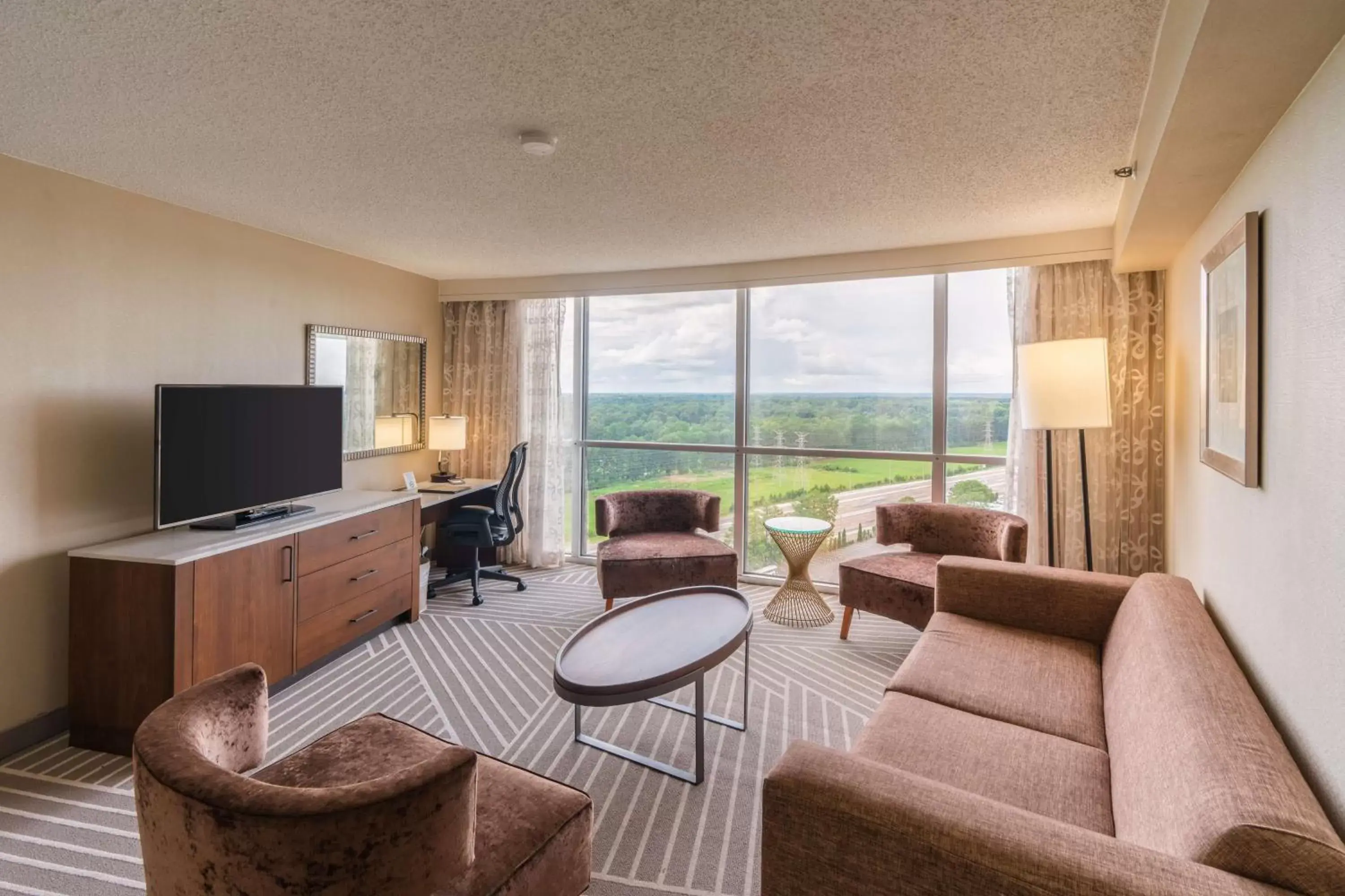 Living room, Seating Area in Hilton Memphis