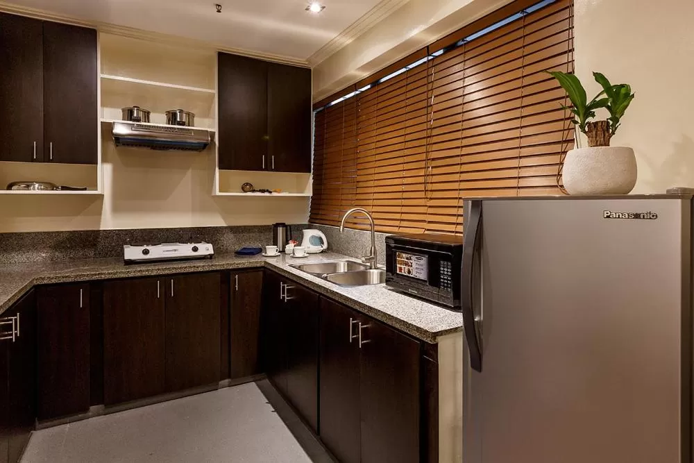 Kitchen or kitchenette in Copacabana Apartment Hotel
