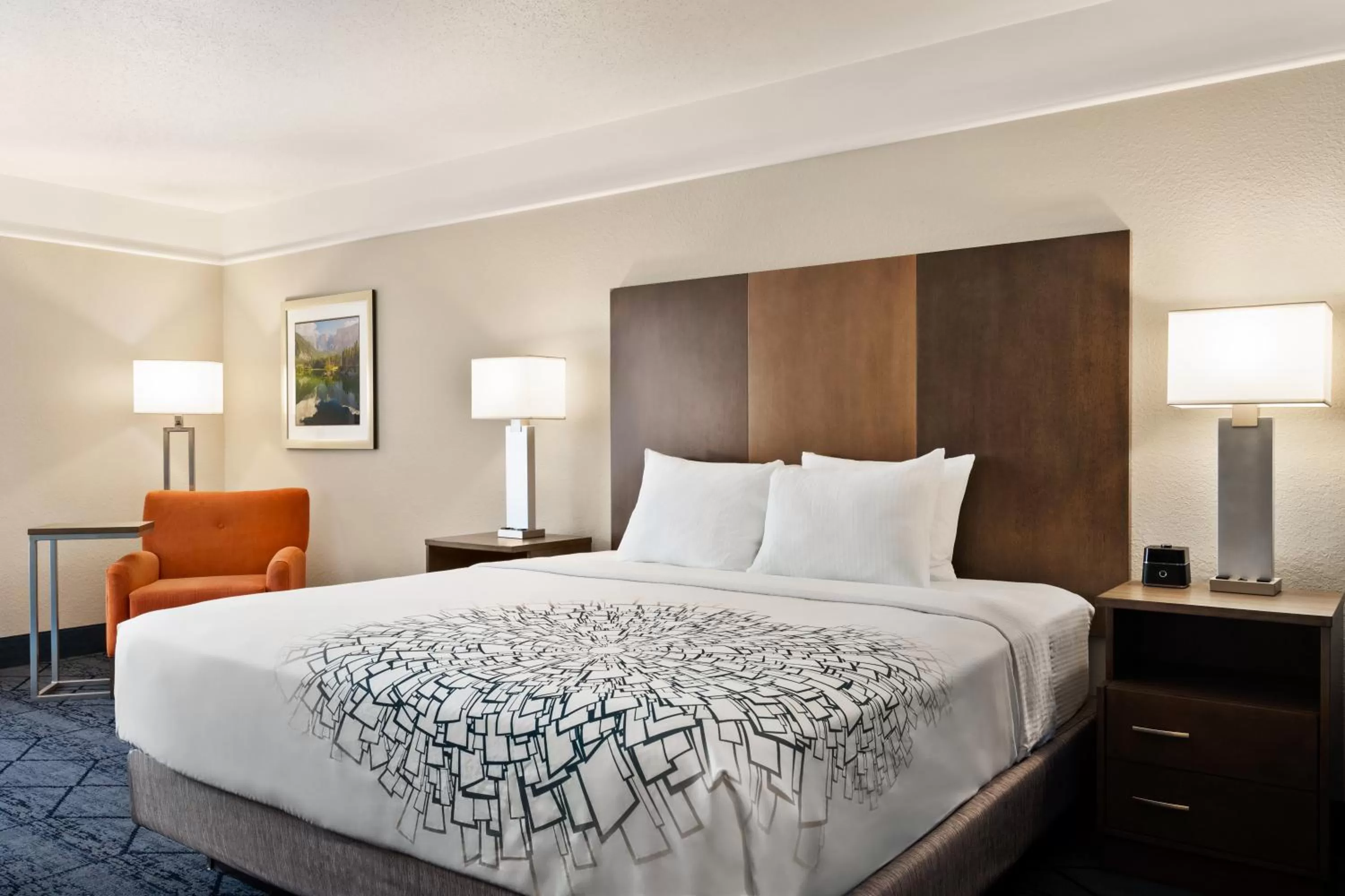 Bed in La Quinta Inn and Suites by Wyndham at WaTiki Waterpark