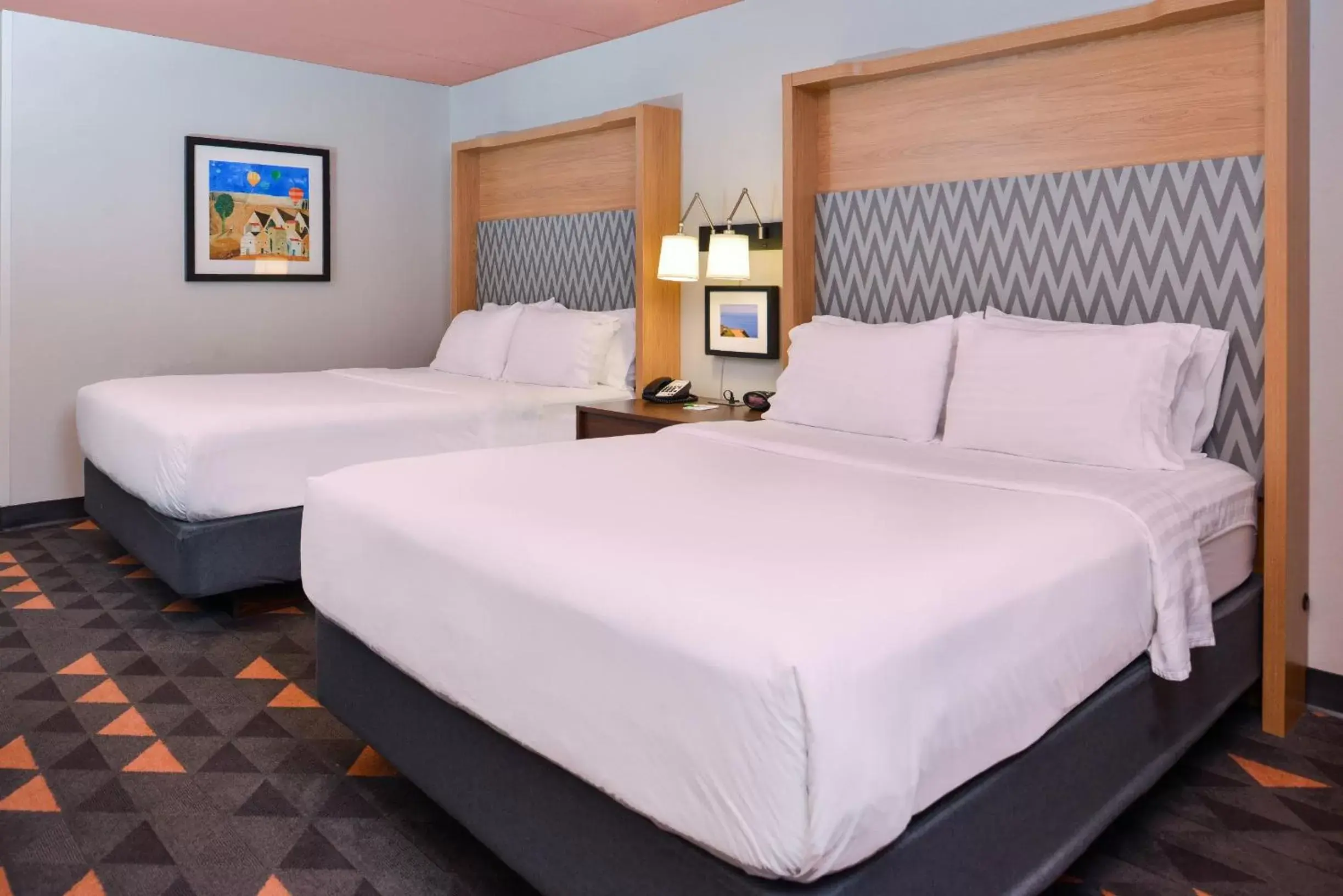 Bed in Holiday Inn Auburn-Finger Lakes Region, an IHG Hotel