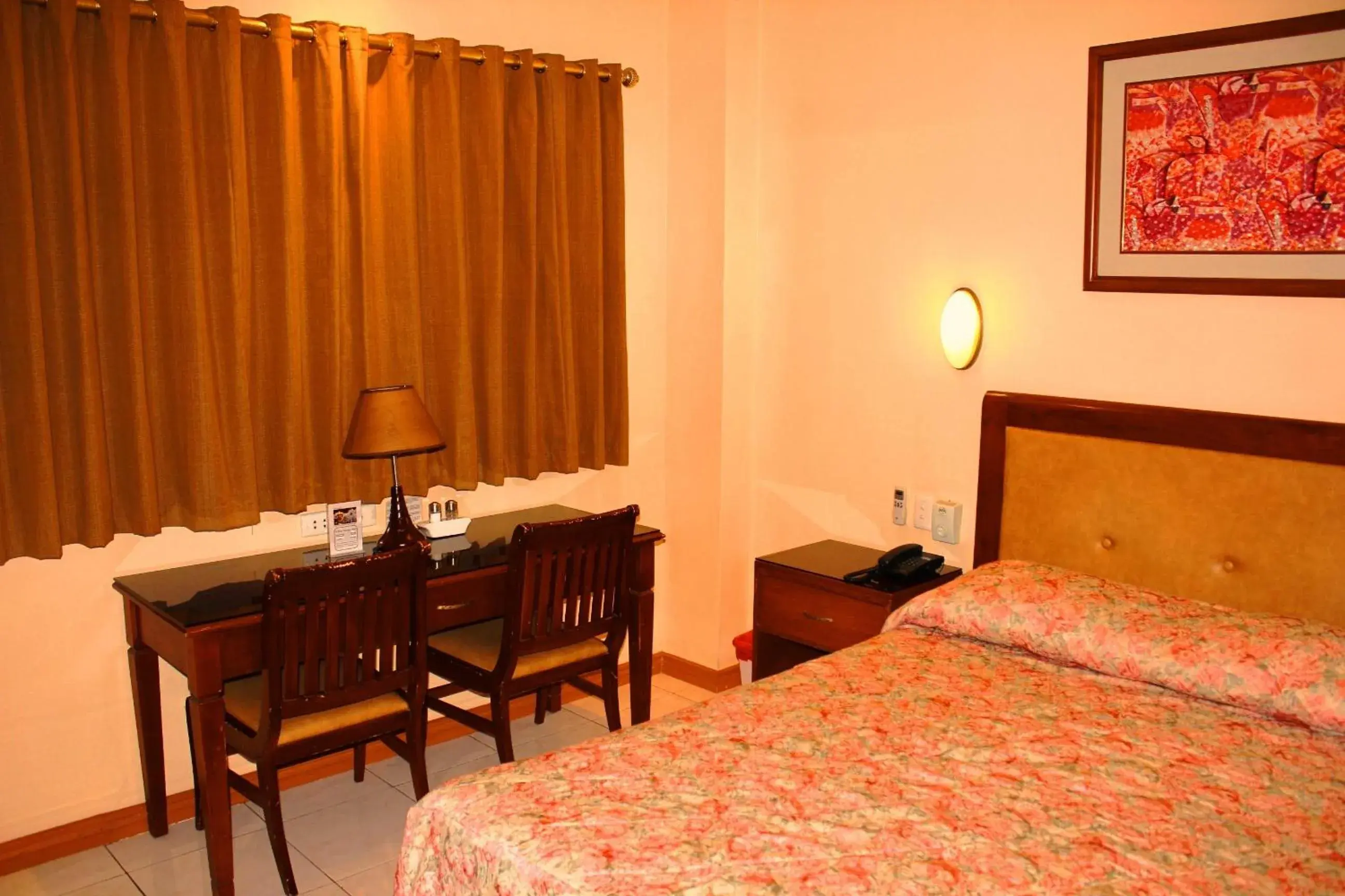 Bedroom, Bed in Pacific Breeze Hotel and Resort Bedroom, Bed in Pacific Breeze Hotel and Resort