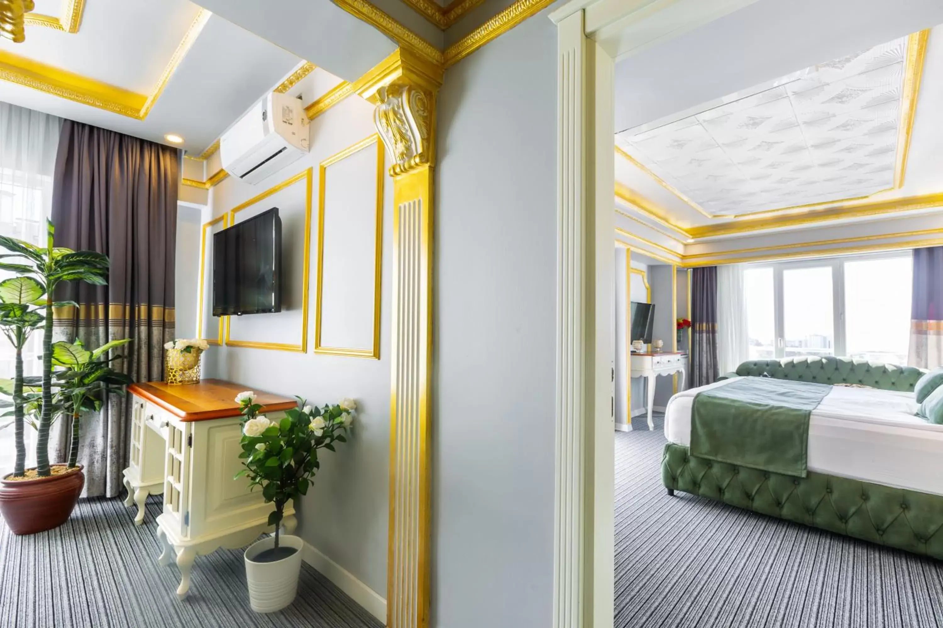 Bedroom, TV/Entertainment Center in Andalouse Elegant Suite Hotel