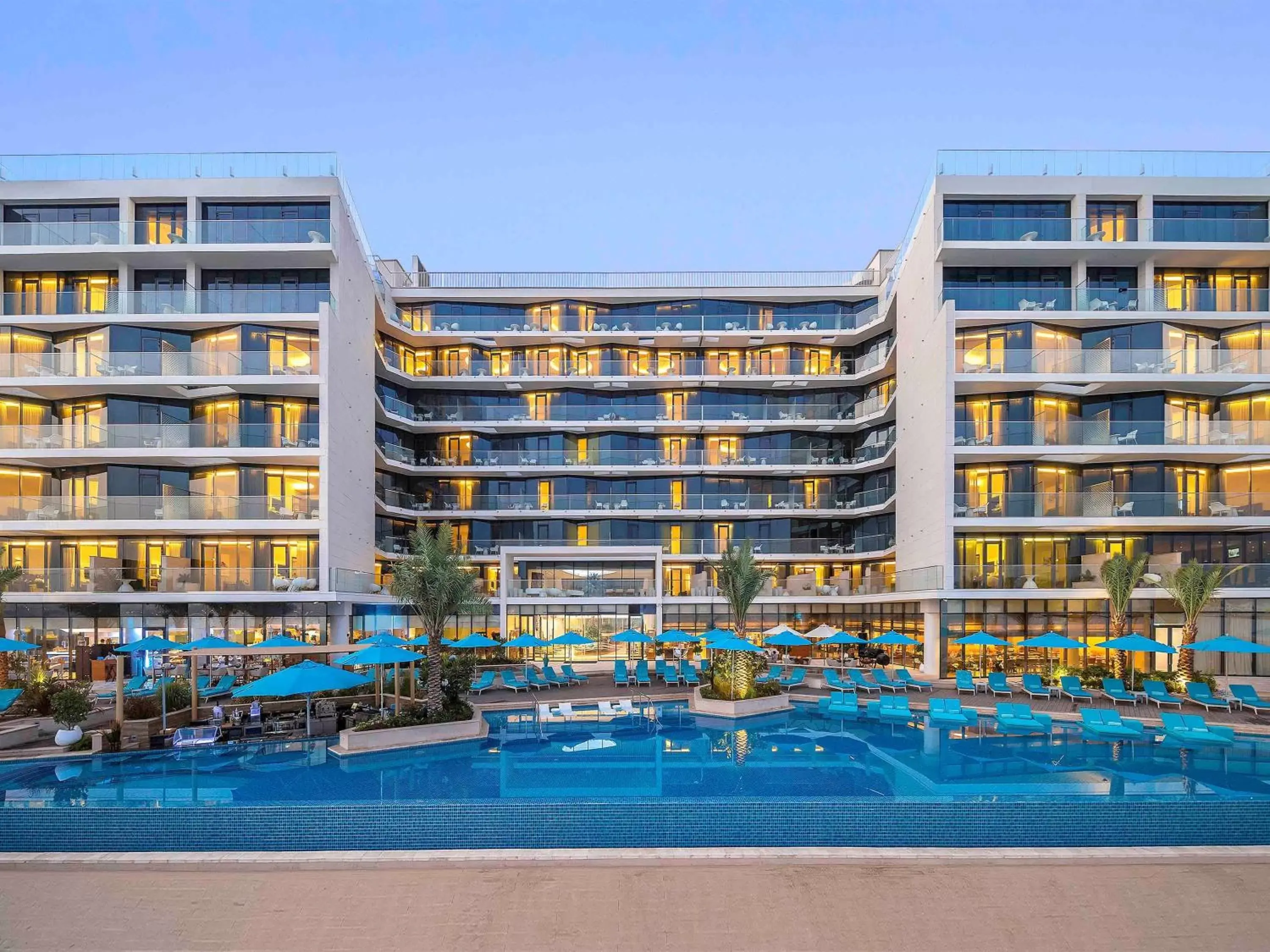 Property building, Swimming Pool in The Retreat Palm Dubai MGallery by Sofitel