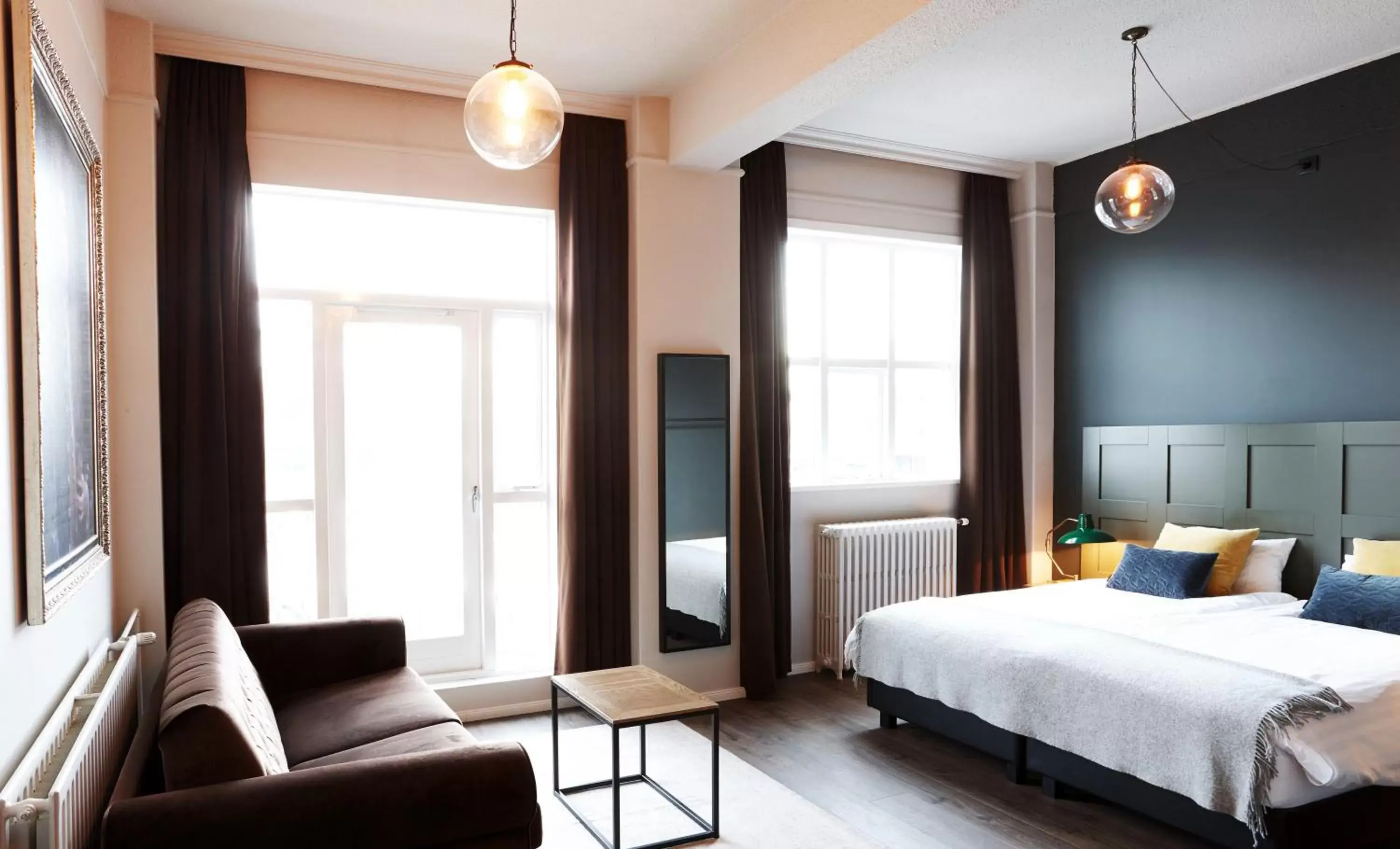 Seating area, Bed in Fosshotel Baron Seating area, Bed in Fosshotel Baron