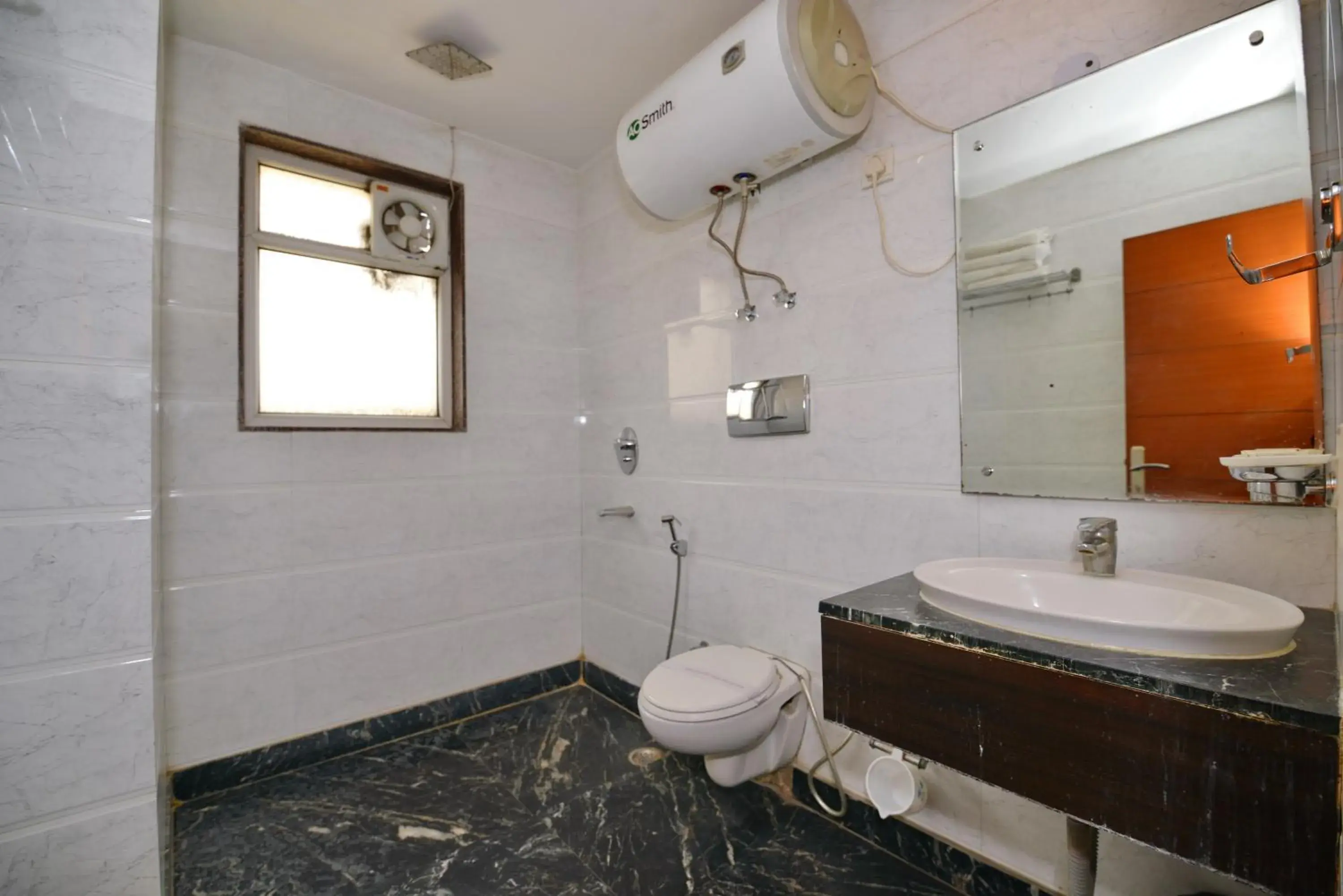 Toilet, Bathroom in Hotel Krishna Deluxe-By RCG Hotels