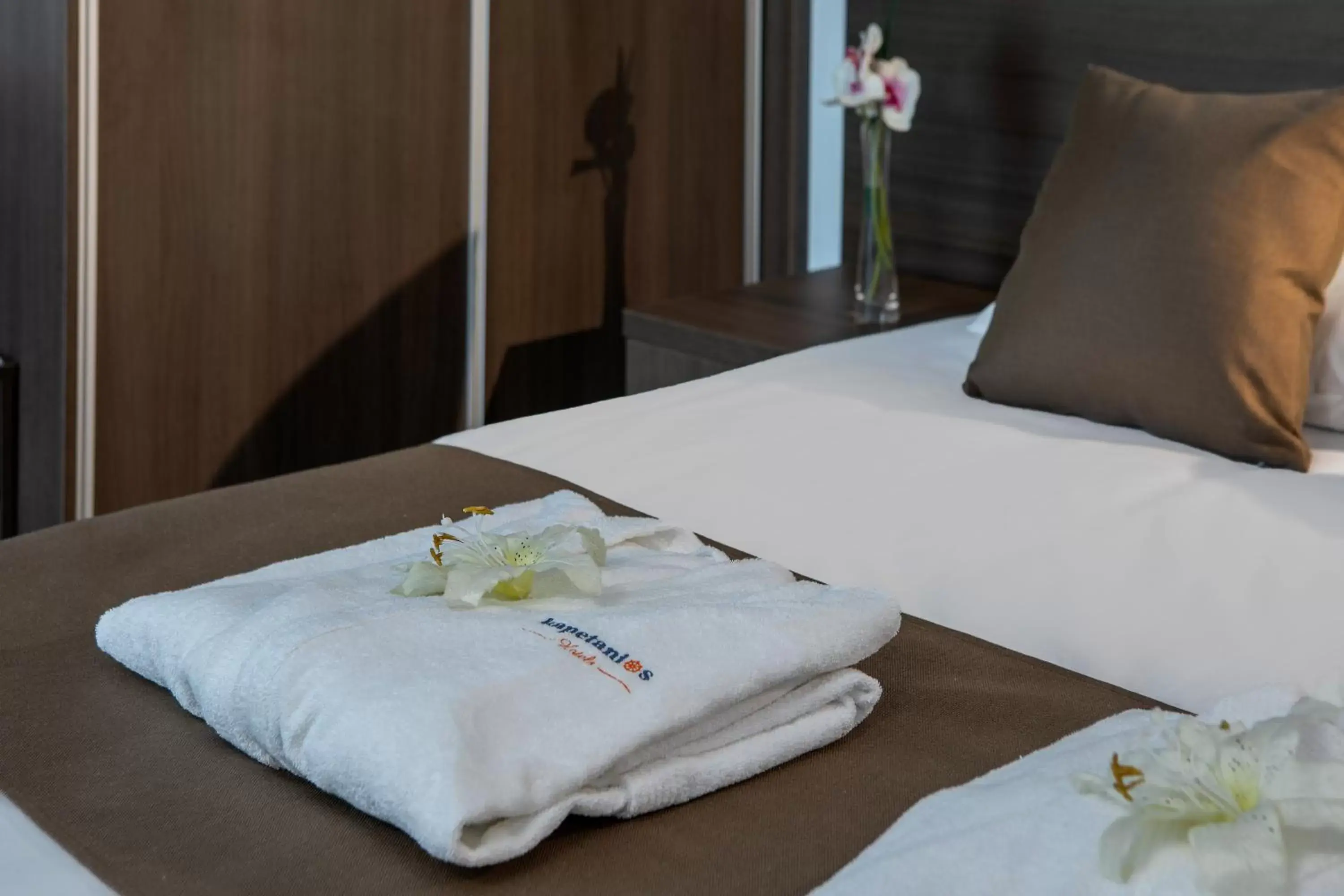 Bed in Kapetanios Limassol Hotel