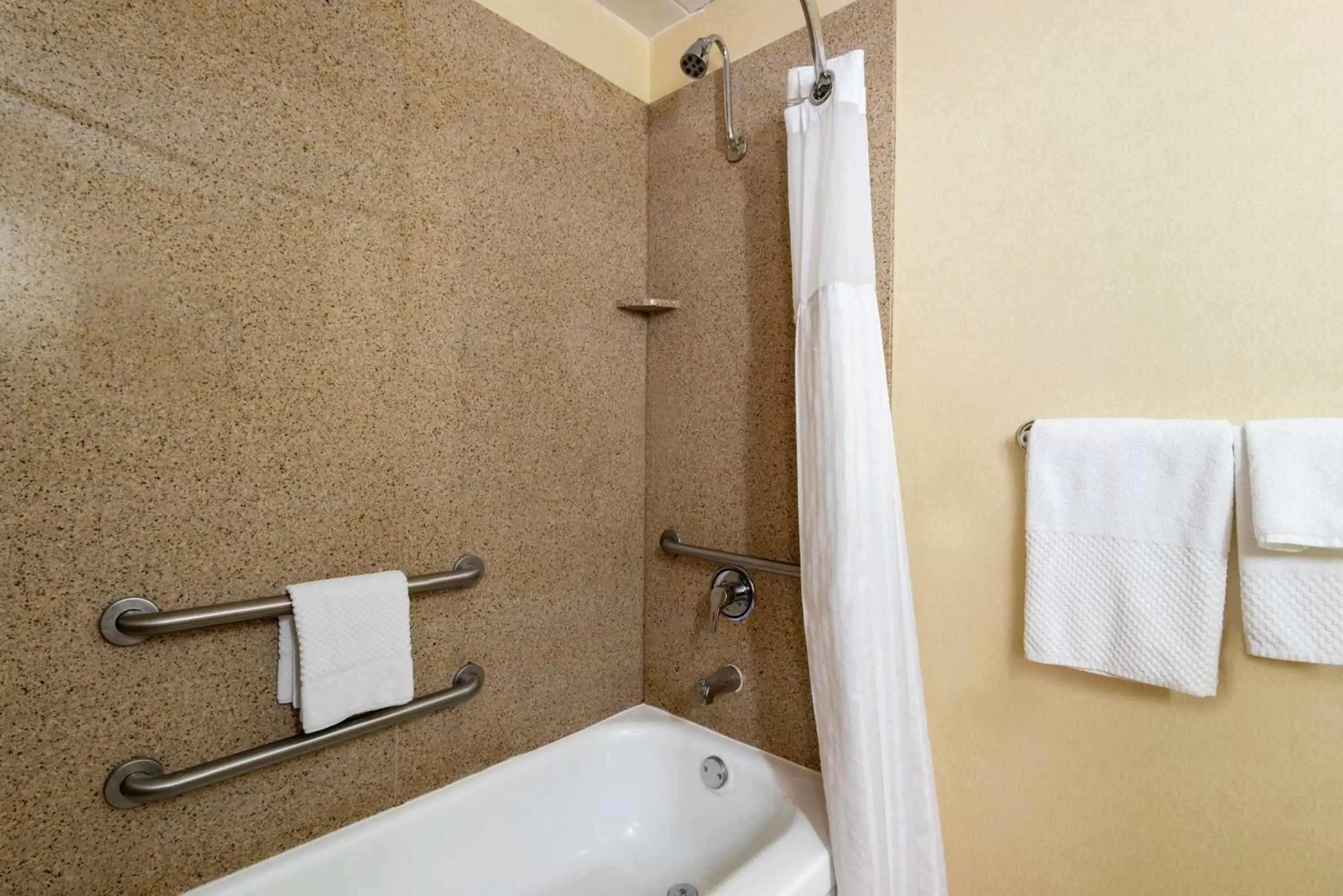 Bathroom in DoubleTree by Hilton Hotel Grand Rapids Airport