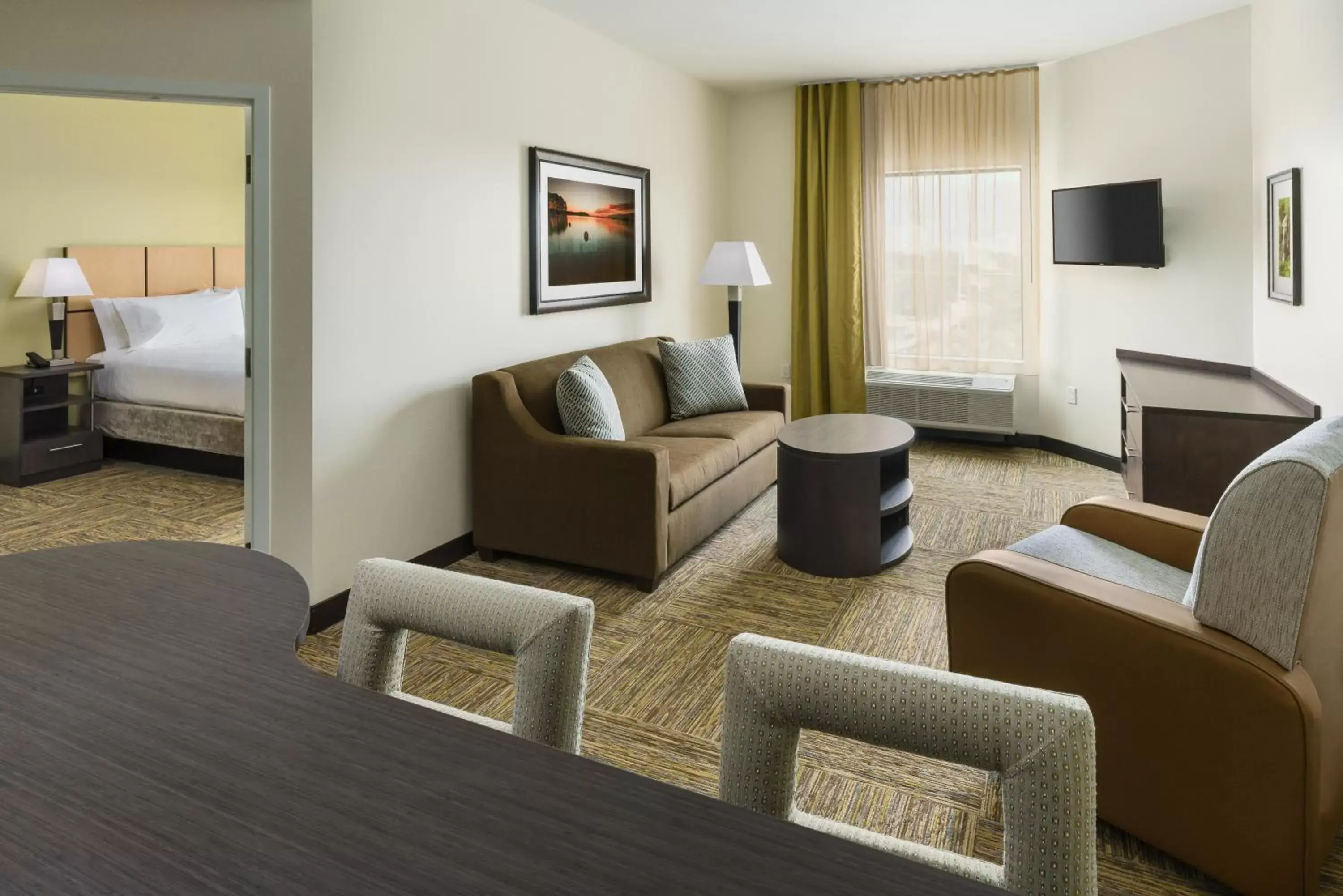 TV and multimedia, Seating Area in Candlewood Suites - Orlando - Lake Buena Vista, an IHG Hotel