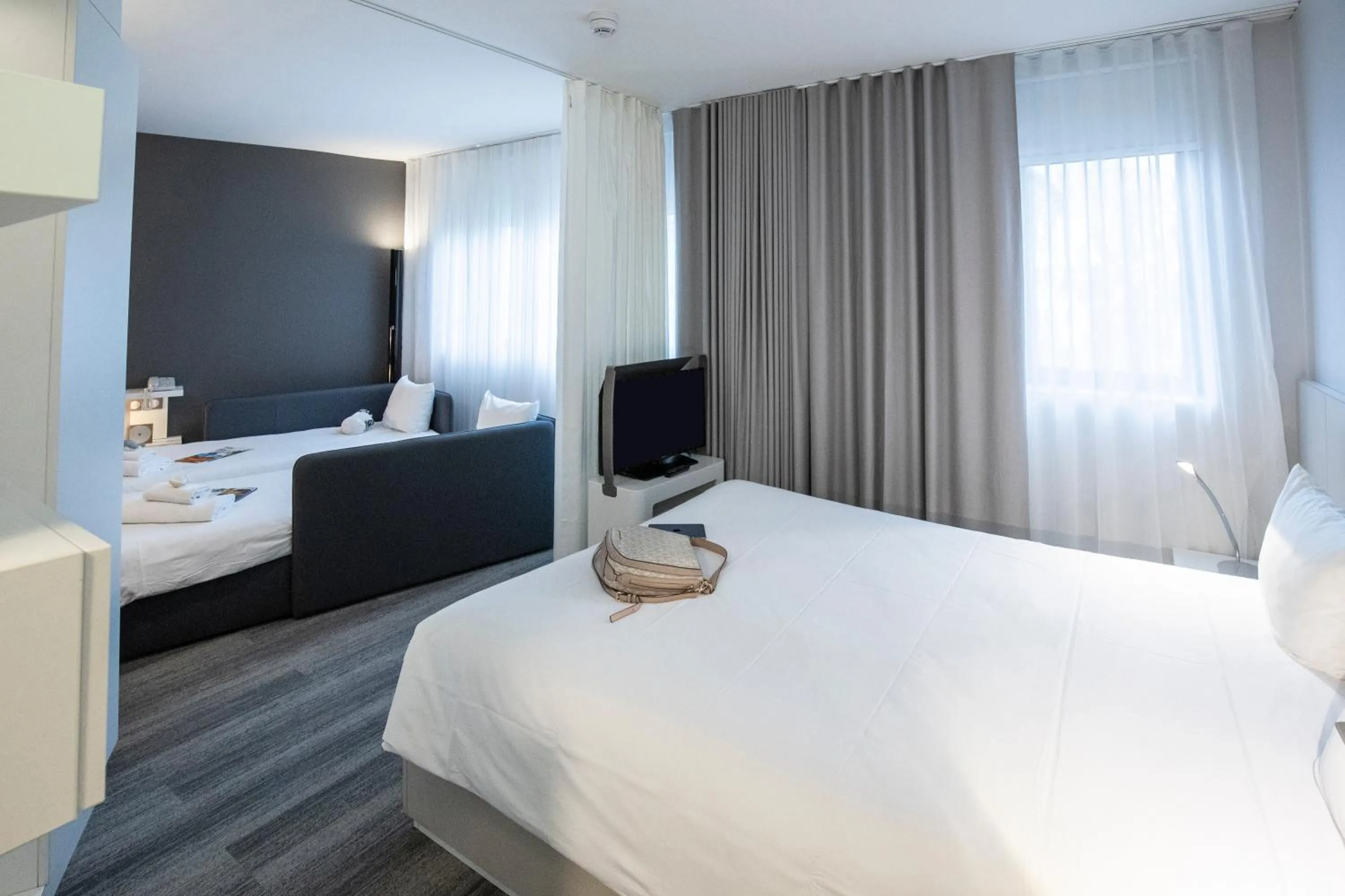 Photo of the whole room, Bed in Novotel Suites Luxembourg