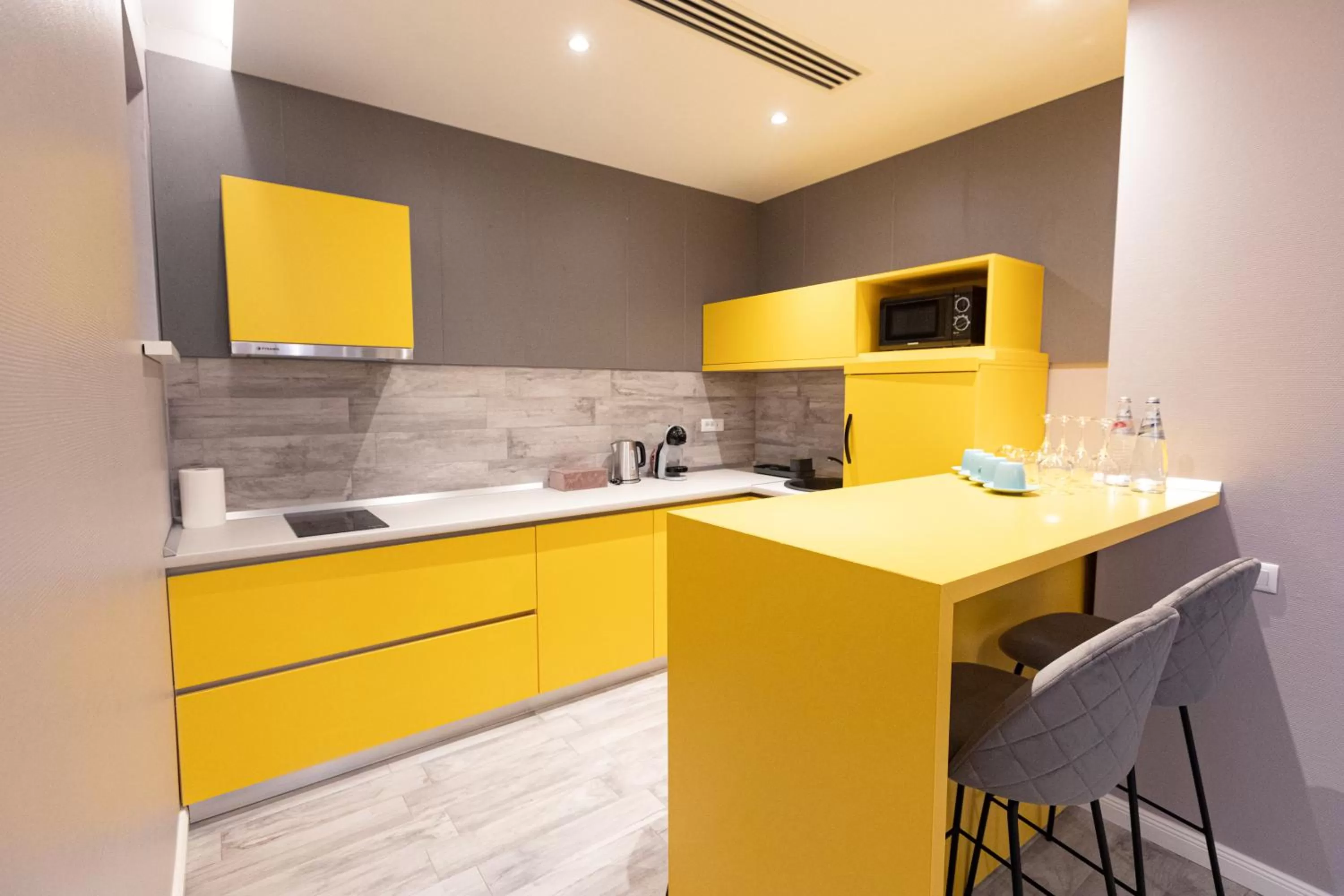 Kitchen or kitchenette in Omnia Apartments