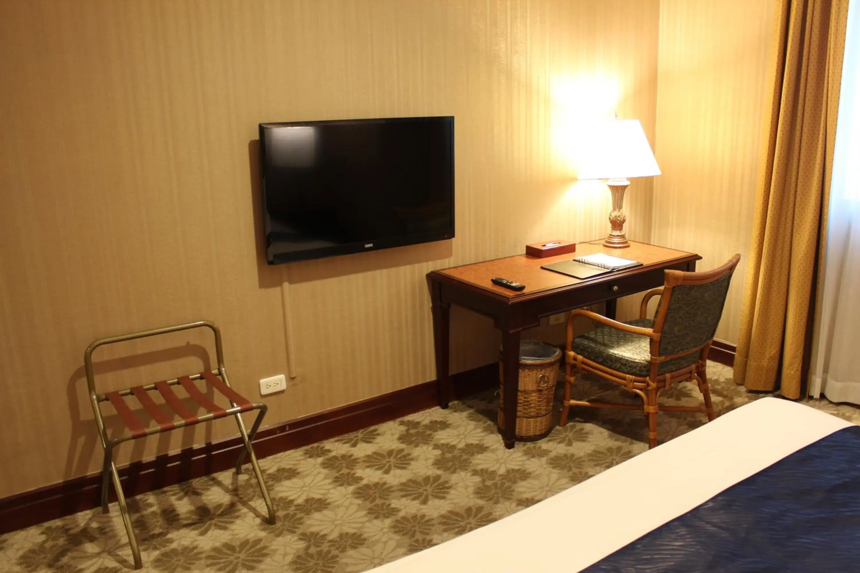 TV and multimedia, TV/Entertainment Center in Wei-Yat Grand Hotel