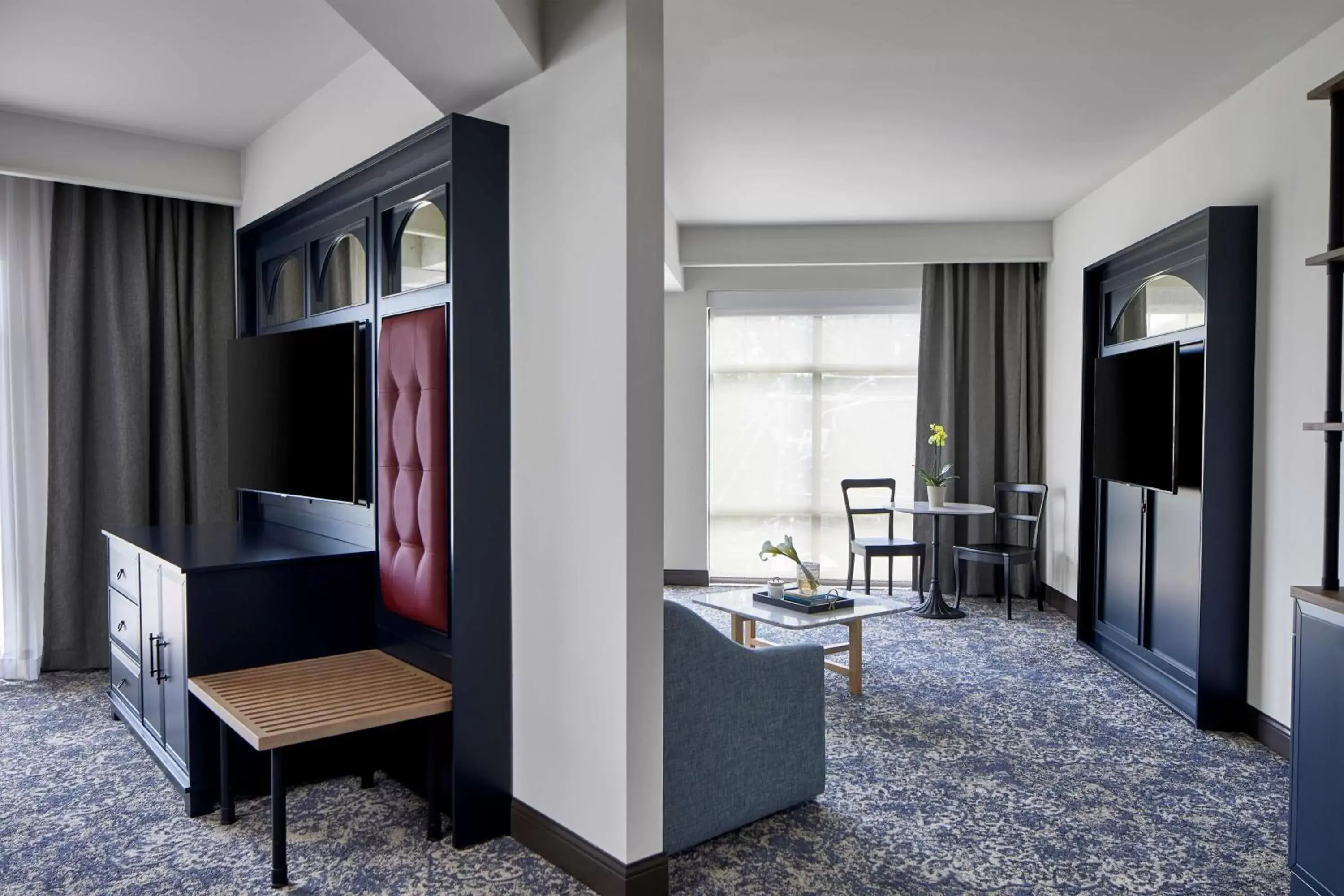 Bedroom, TV/Entertainment Center in The Hamilton Alpharetta, Curio Collection By Hilton