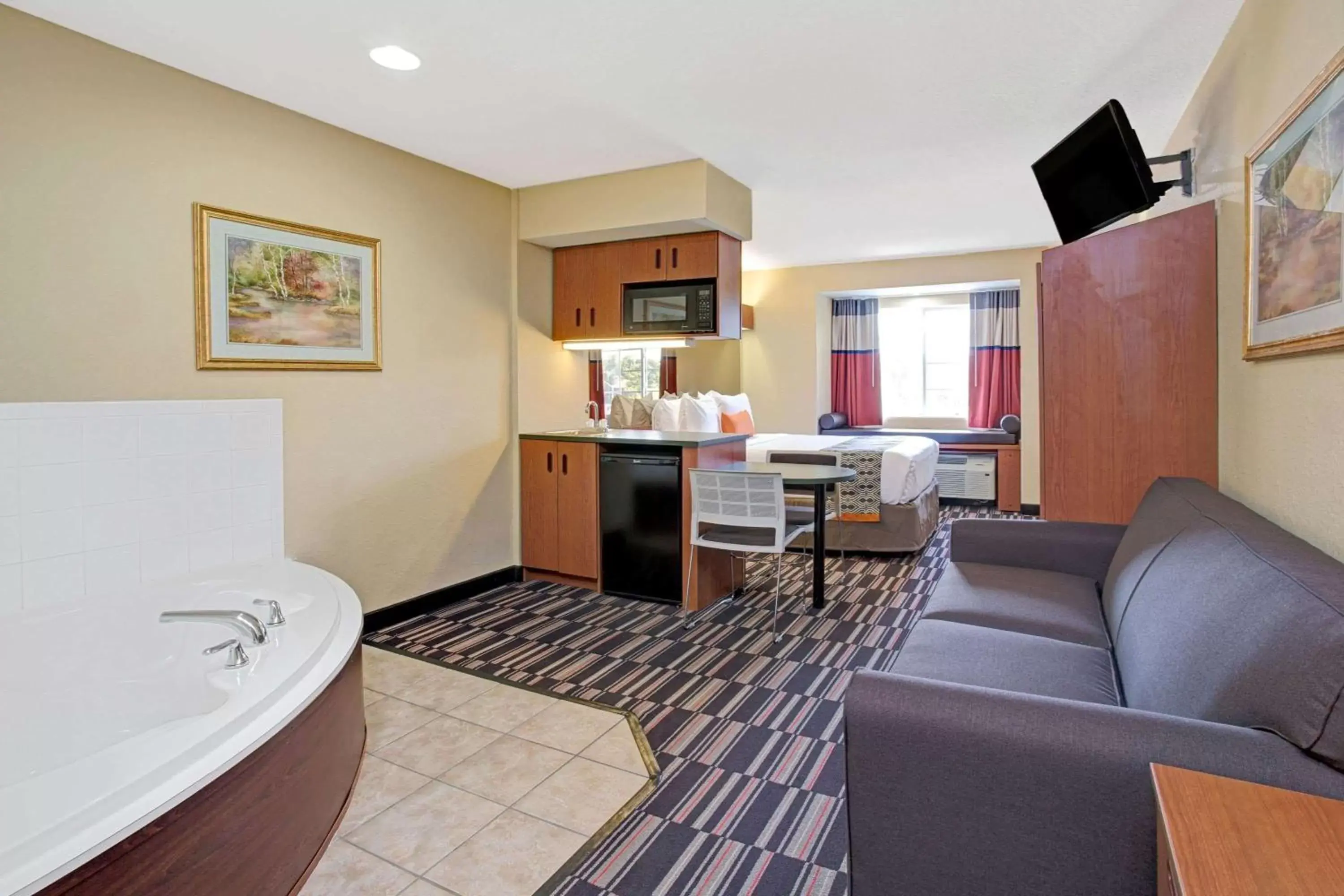 Photo of the whole room, Seating Area in Microtel Inn & Suites by Wyndham Bushnell