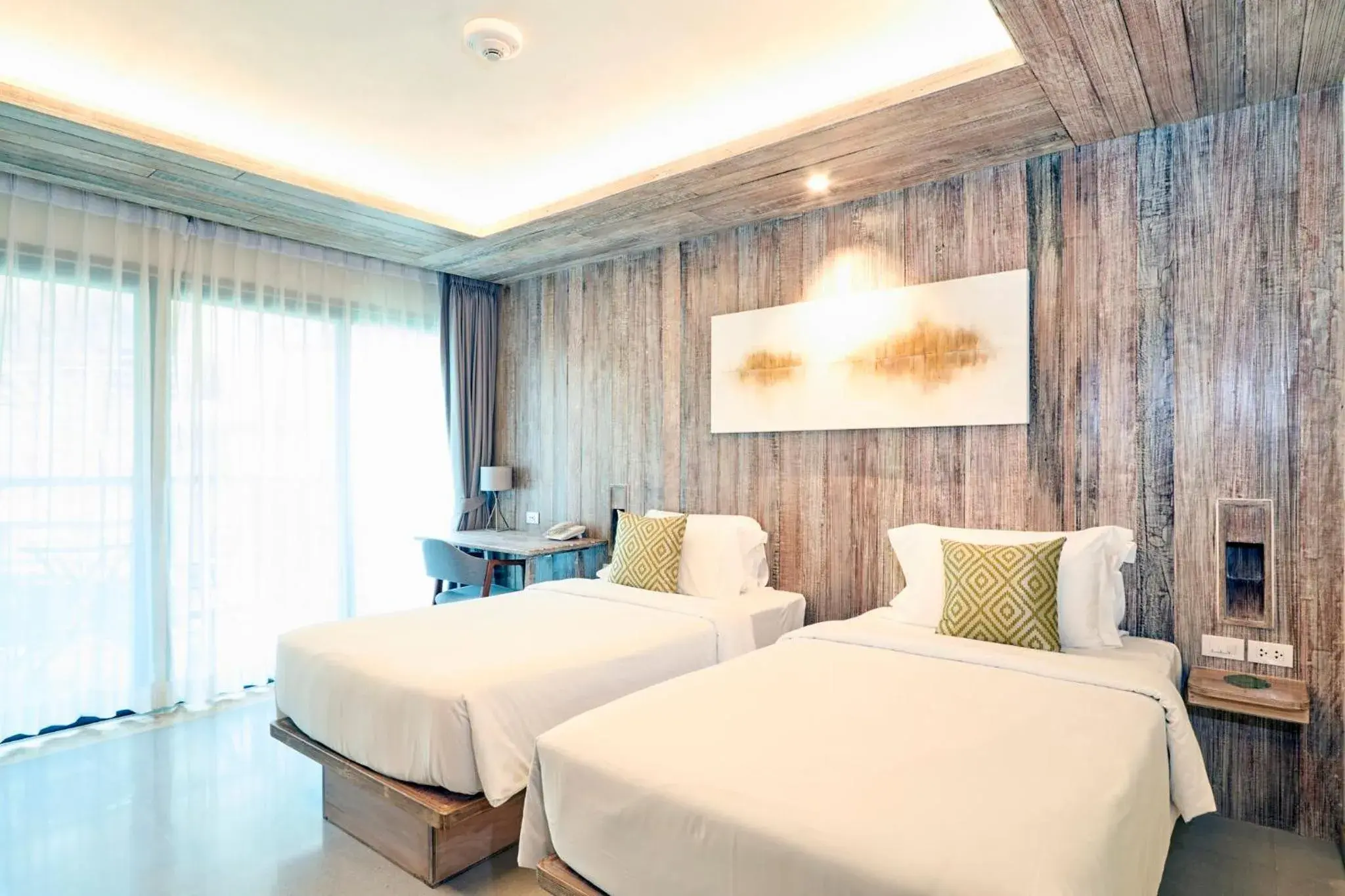 Photo of the whole room, Bed in Dinso Resort & Villas Phuket an IHG Hotel