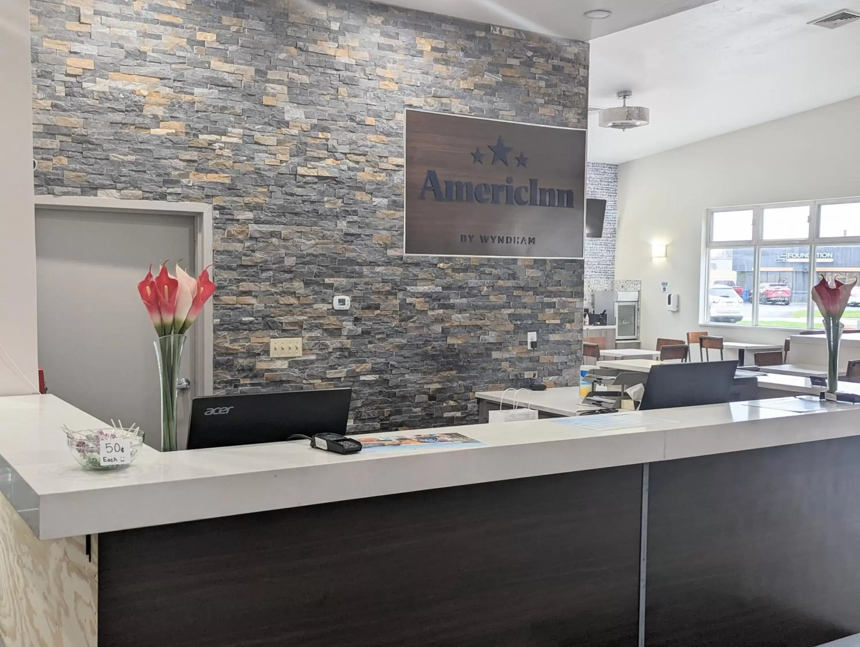 Lobby or reception in AmericInn by Wyndham Green Bay Near Stadium Lobby or reception in AmericInn by Wyndham Green Bay Near Stadium