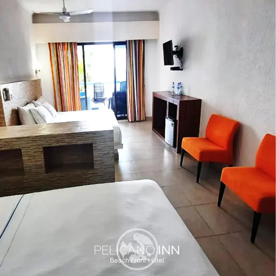 Photo of the whole room in Pelicano Inn Playa del Carmen - Beachfront Hotel