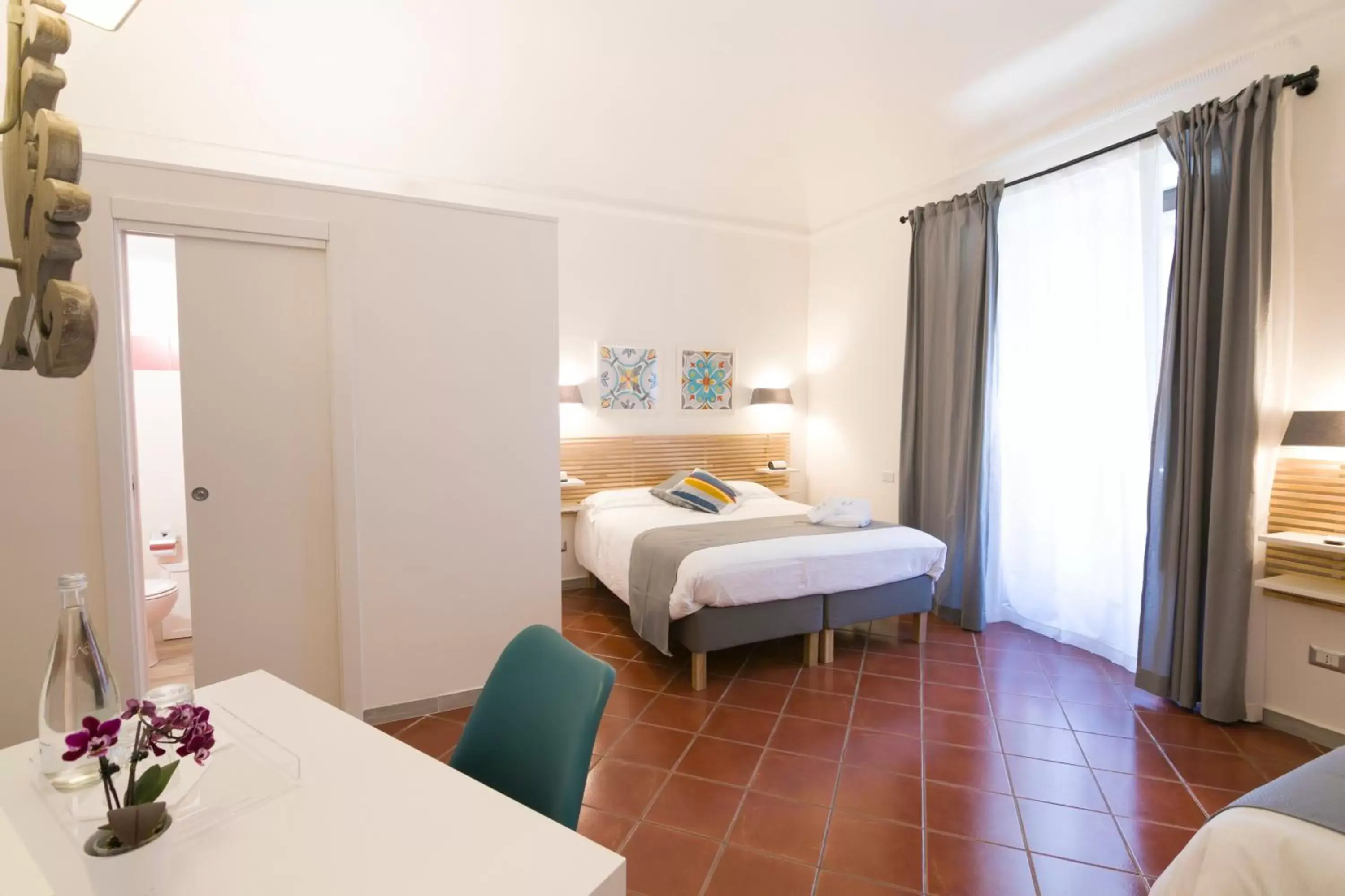 Photo of the whole room, Bed in Residenza Normanna