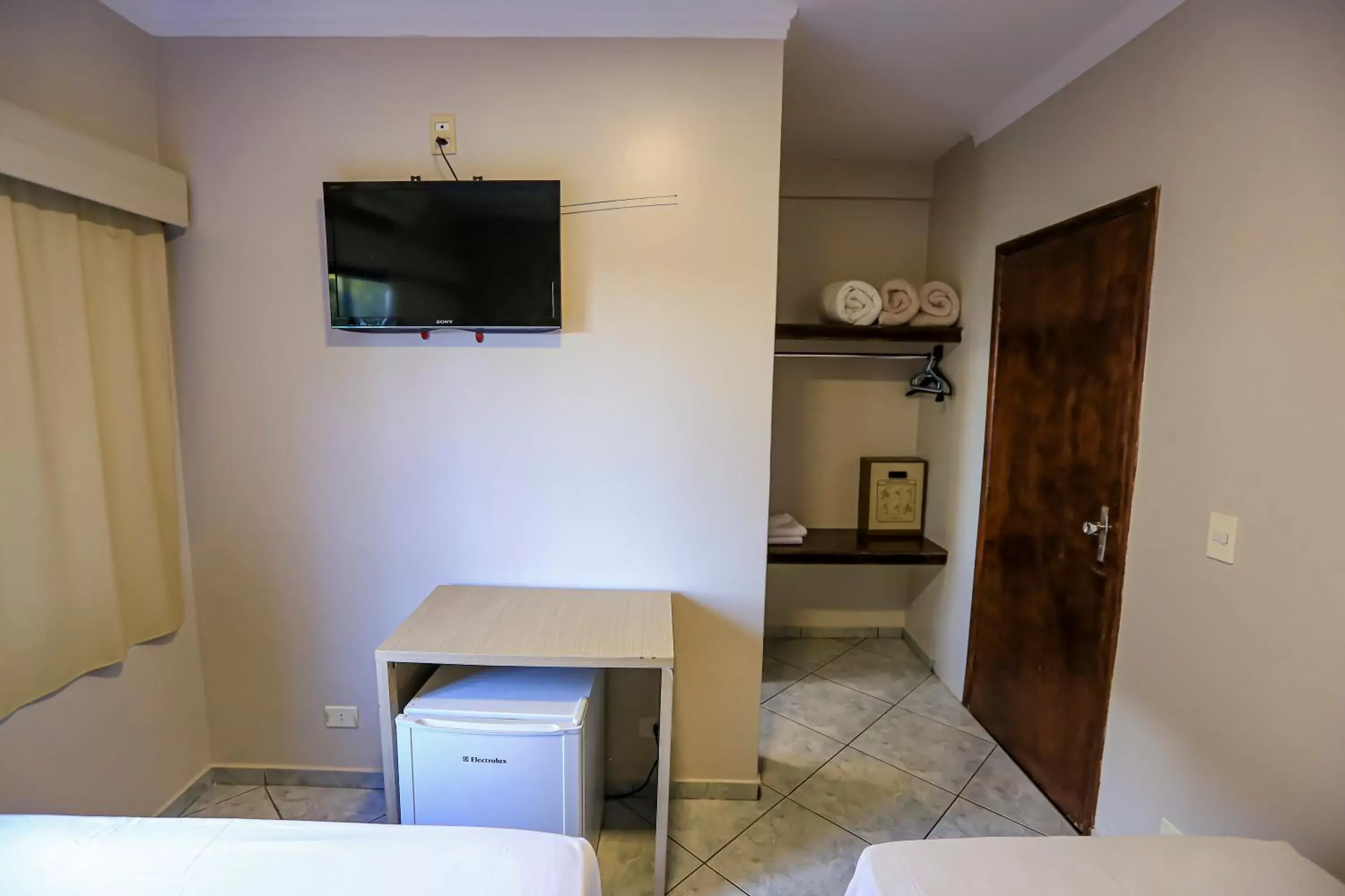 TV and multimedia, TV/Entertainment Center in Foz Express Hotel Centro