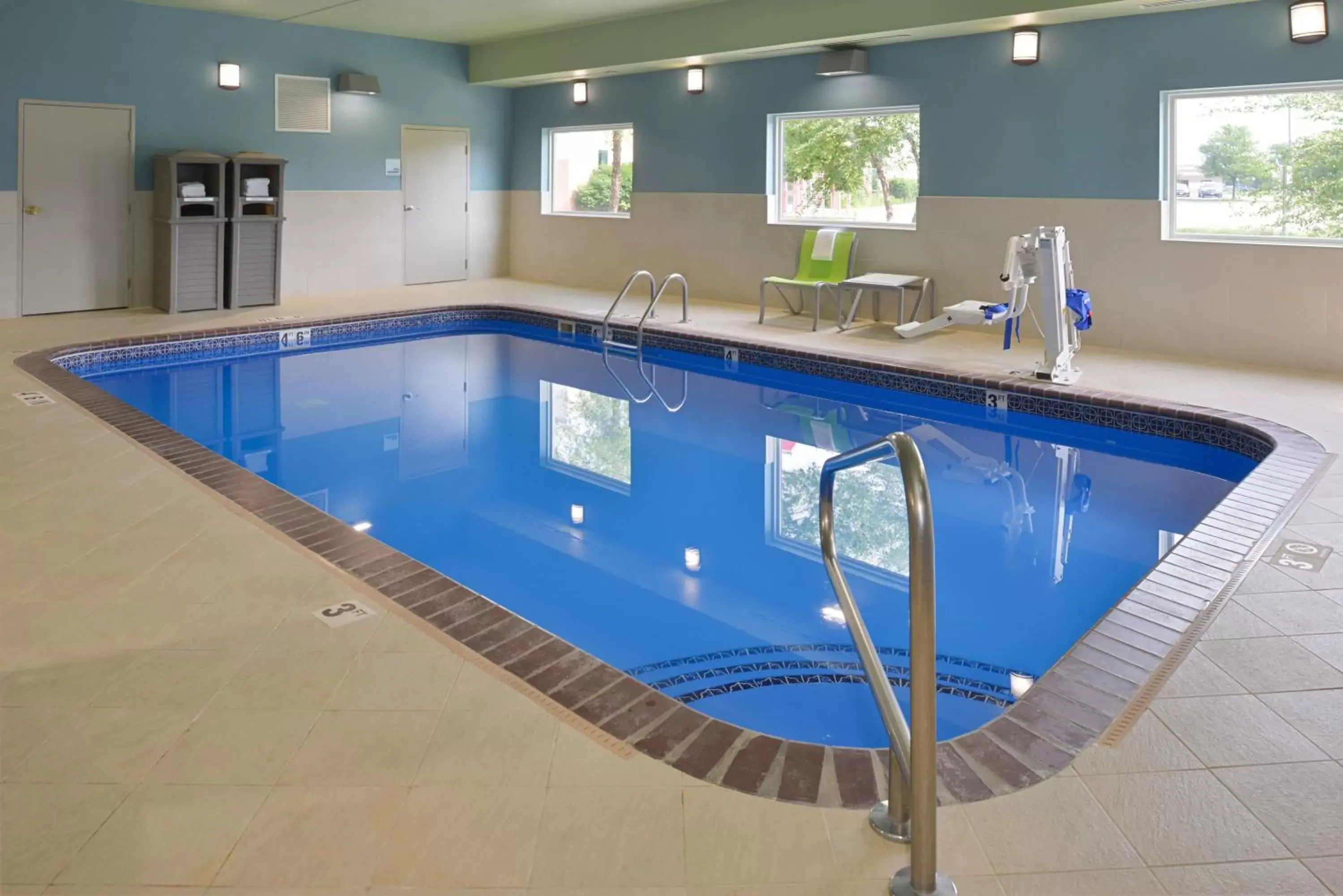 Swimming Pool in Holiday Inn Express & Suites - Omaha - 120th and Maple, an IHG Hotel