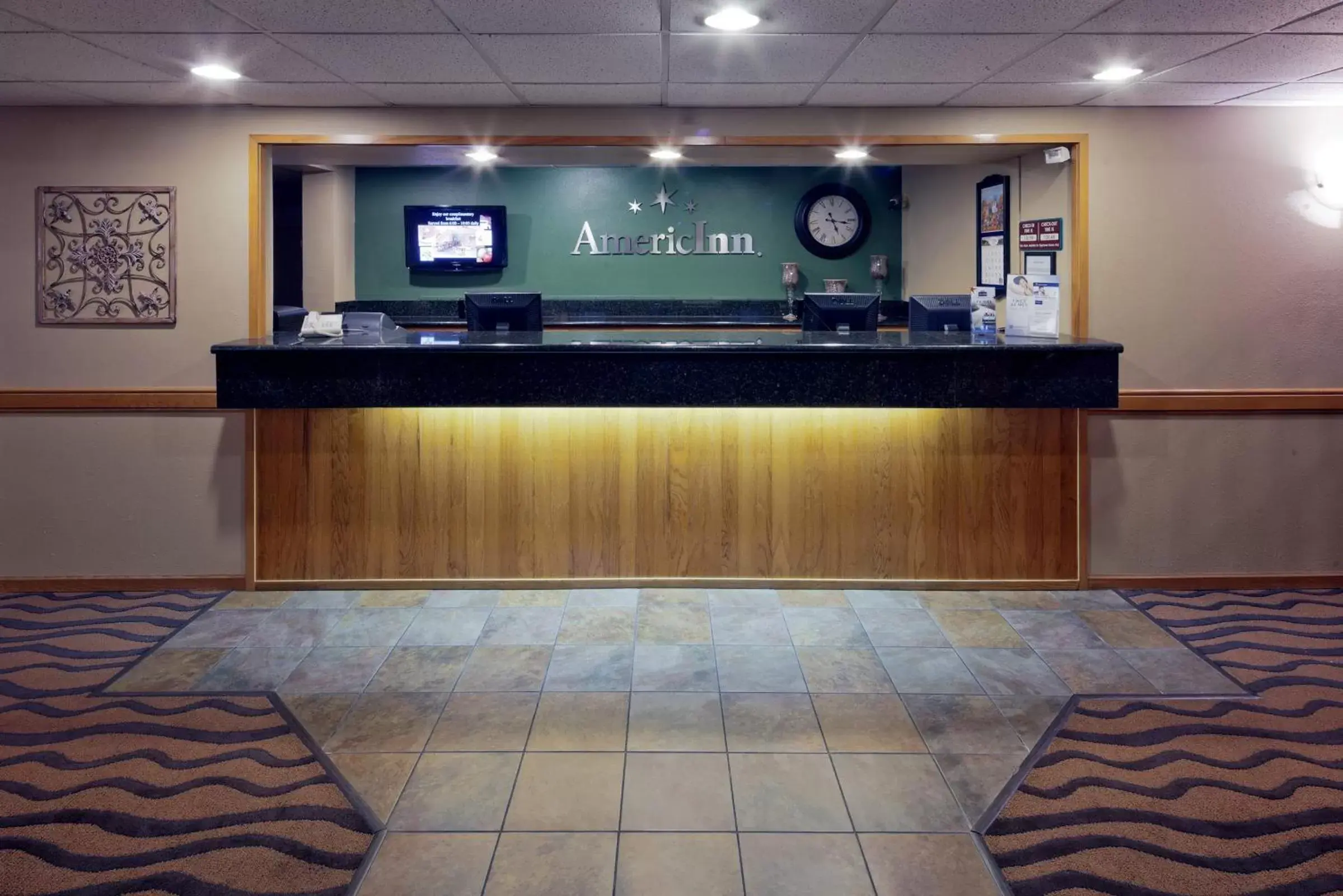 Facade/entrance, Lobby/Reception in AmericInn by Wyndham Hartford WI