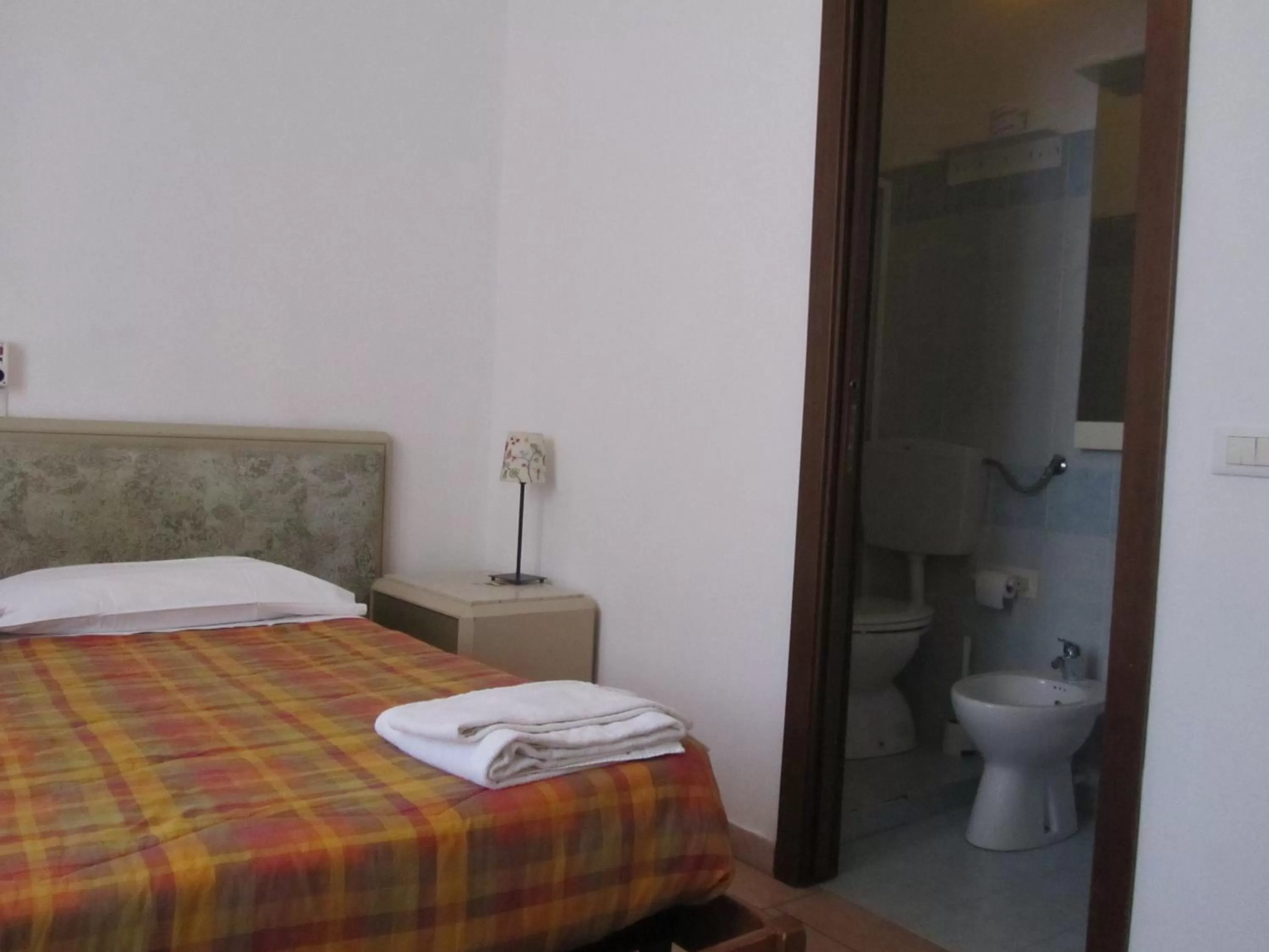 Bed in Hotel Gambara