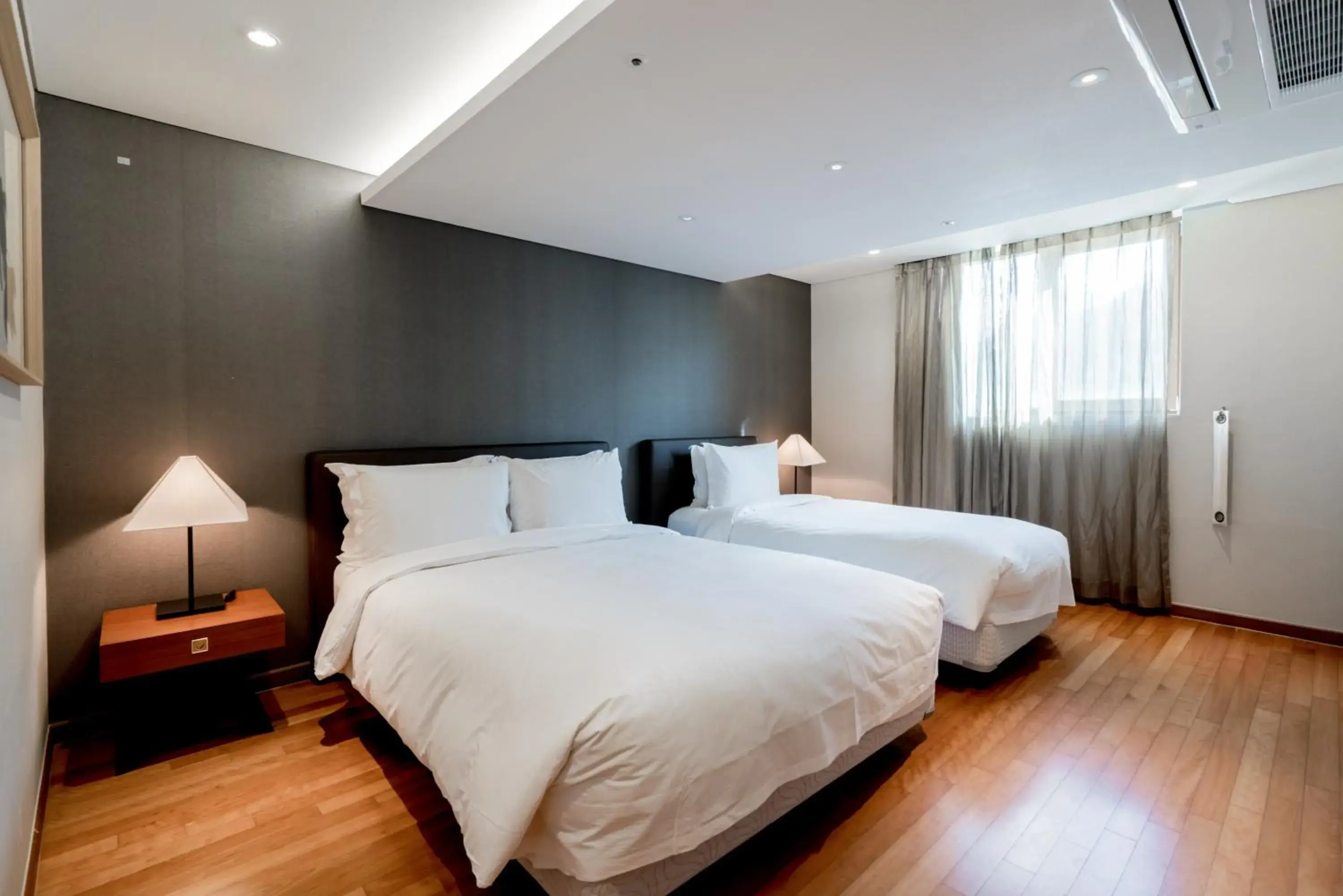 Bed in Oriens Hotel & Residences Myeongdong