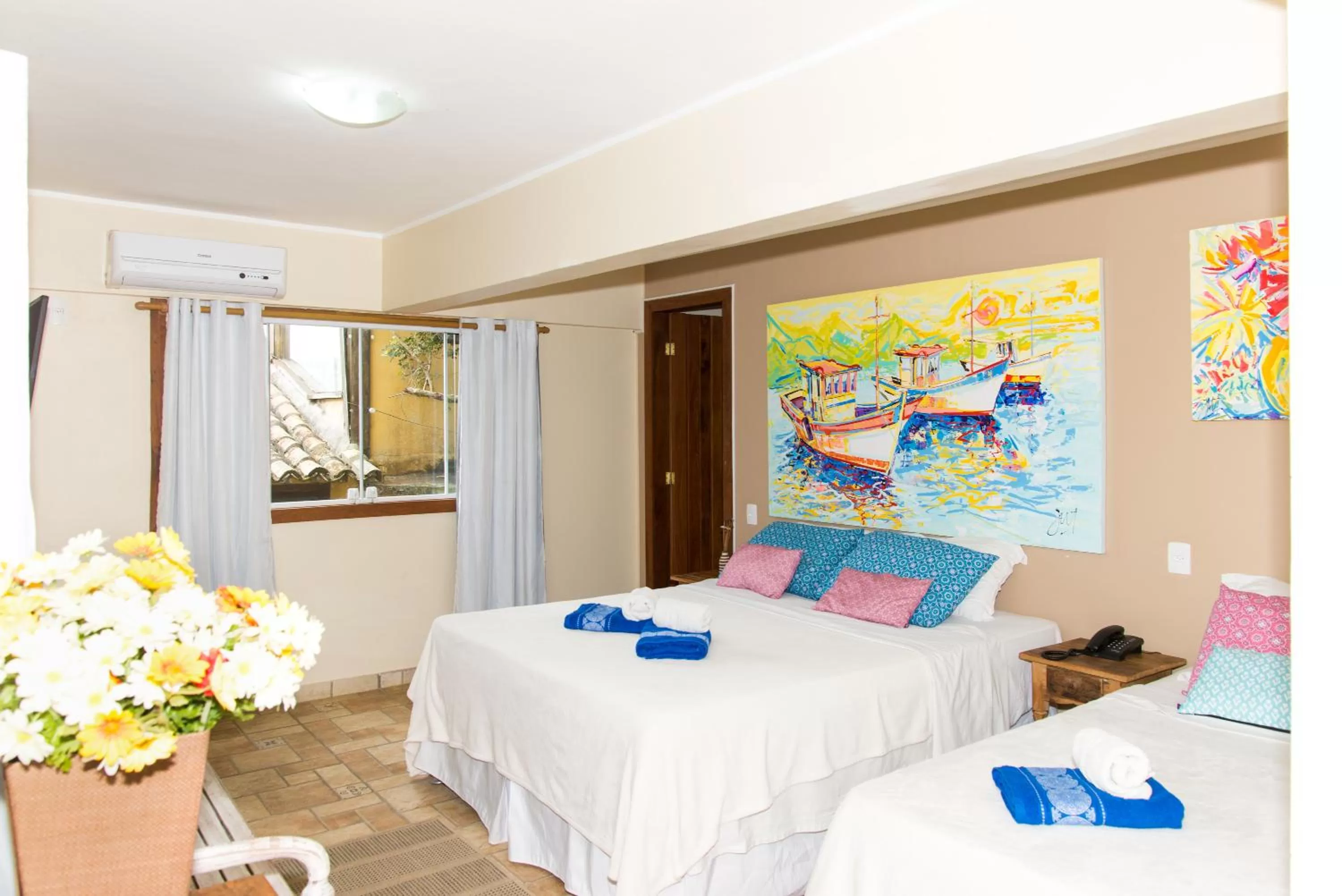 Bed in Pousada La Dolce Vita