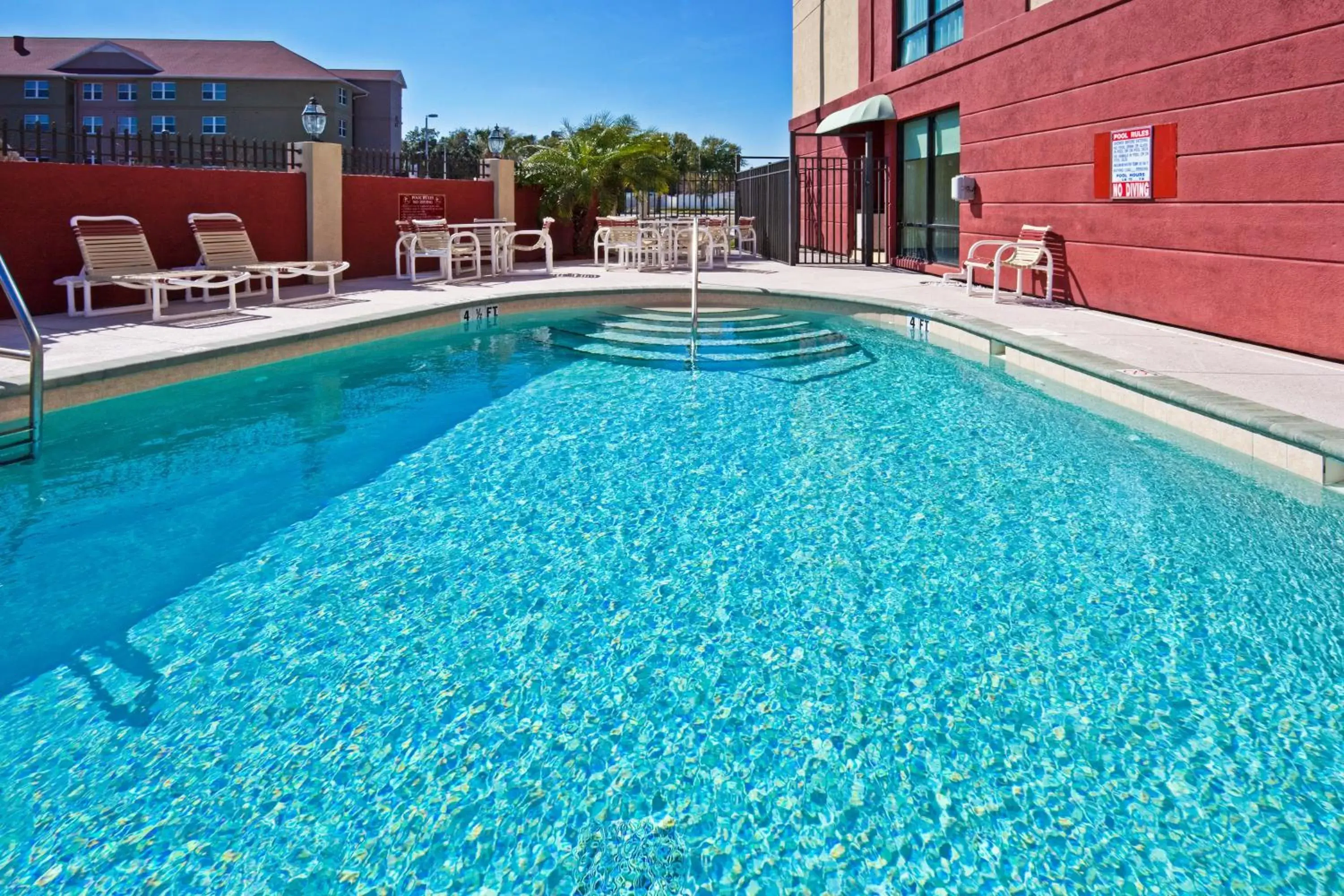 Swimming Pool in Holiday Inn Express Hotel & Suites Tampa-Oldsmar, an IHG Hotel