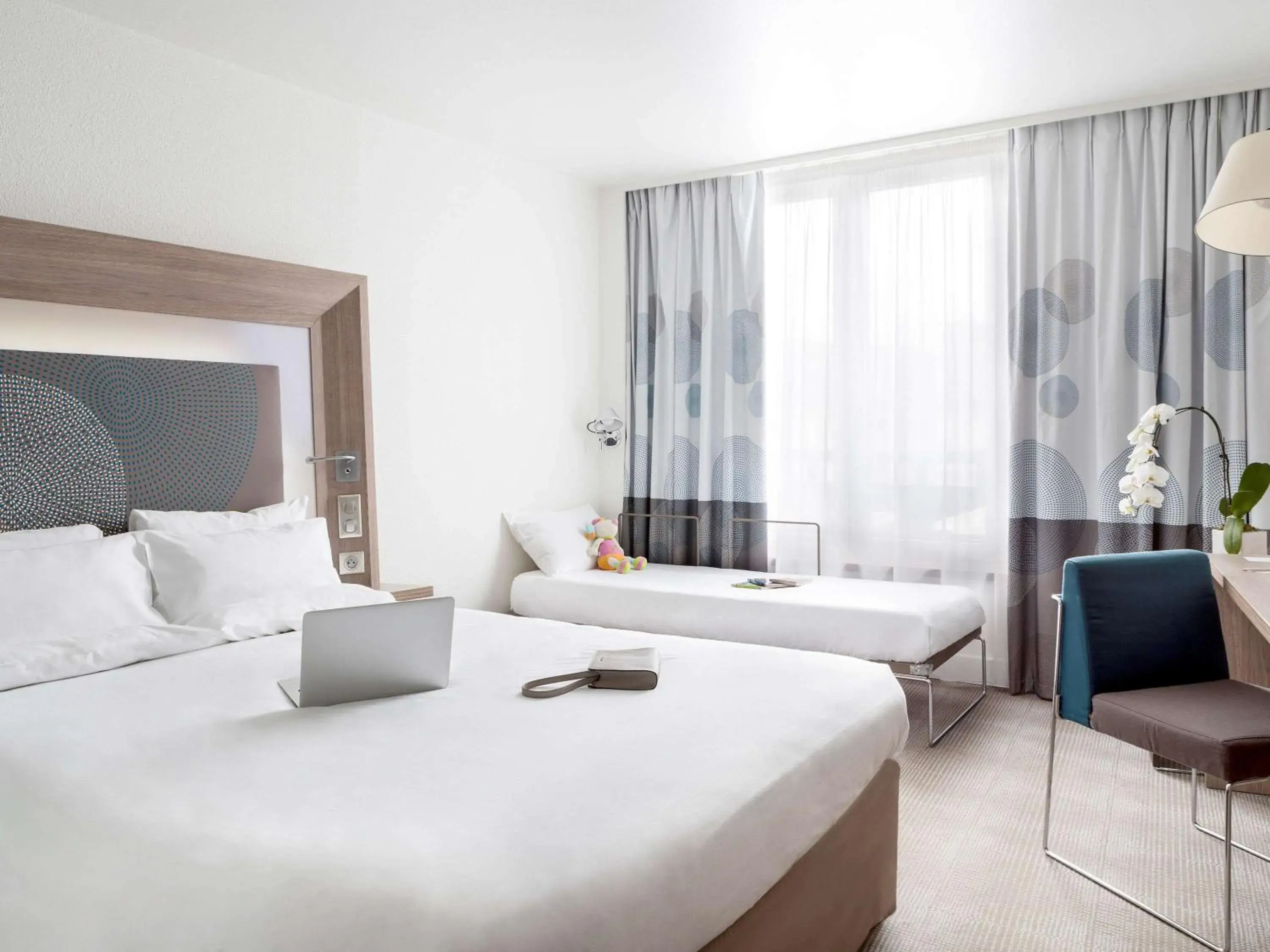 Photo of the whole room, Bed in Novotel Paris Saint Denis Stade Basilique