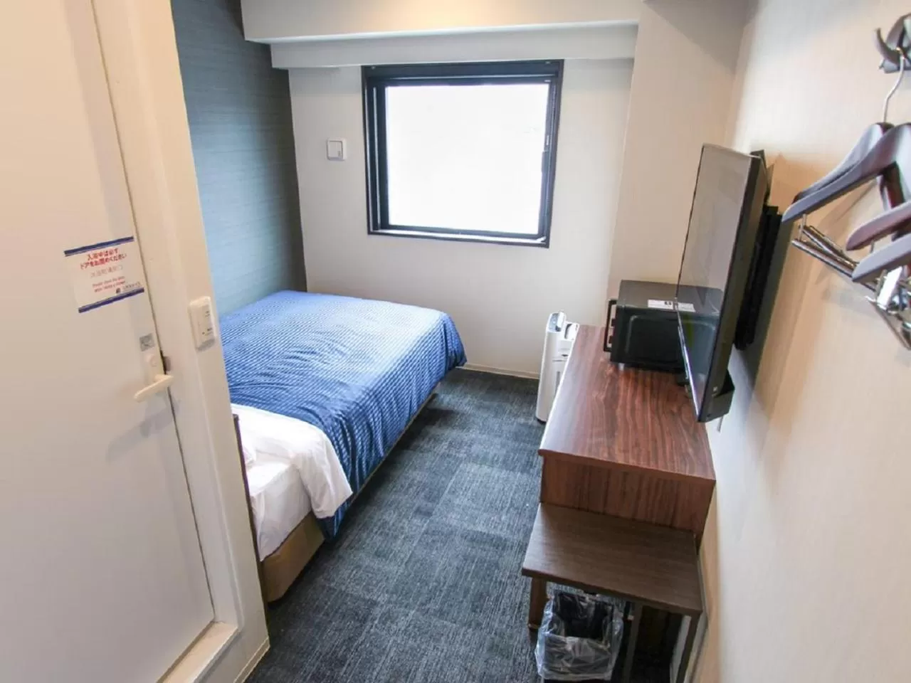 Bed in HOTEL LiVEMAX Umeda WEST